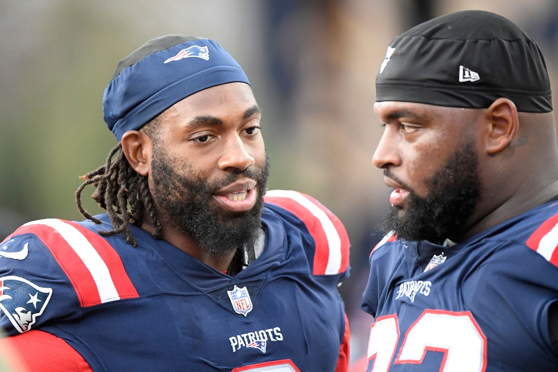 Nov 6, 2022; Foxborough, Massachusetts, USA; New England Patriots linebacker Matthew Judon (9) talks with defensive tackle Davon Godchaux (92) during the second half against the Indianapolis Colts at Gillette Stadium. Mandatory Credit: Bob DeChiara-USA TODAY Sports