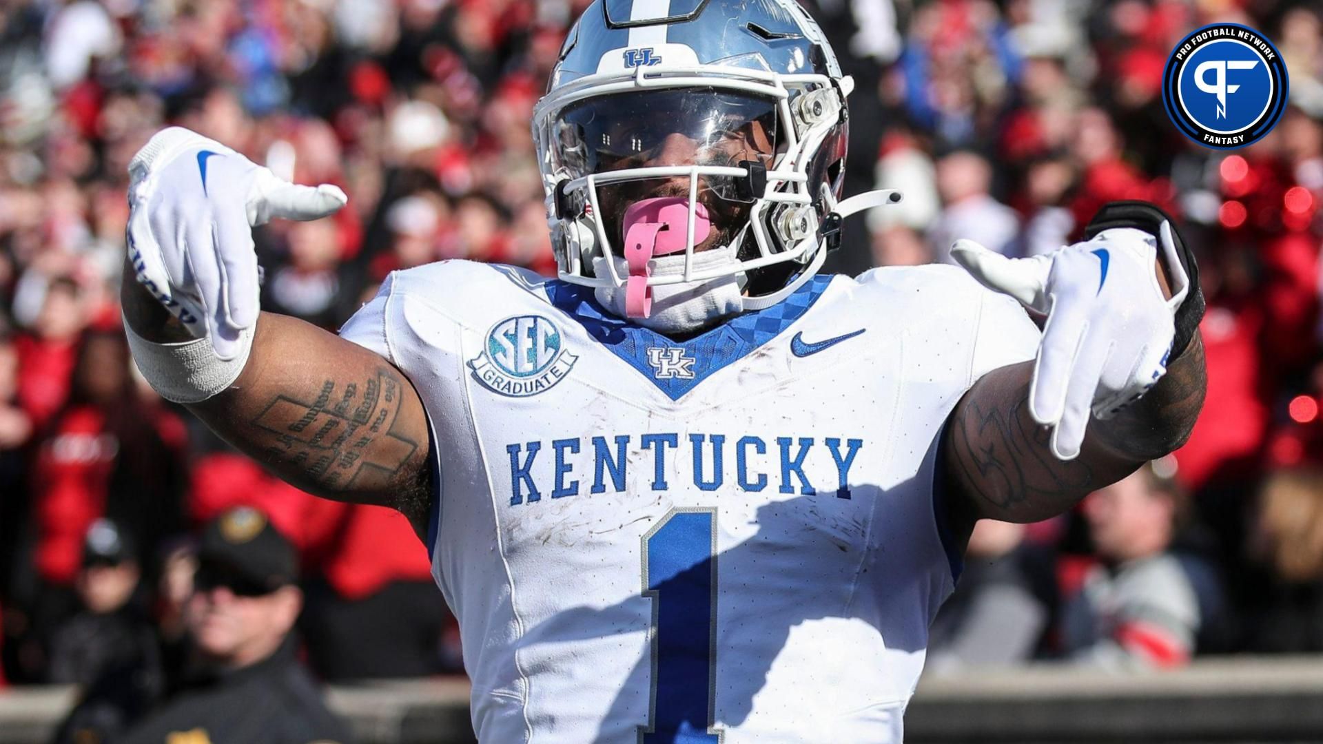 Kentucky Wildcats running back Ray Davis (1) throws down Ls after scoring in the third quarter. Nov. 24, 2023