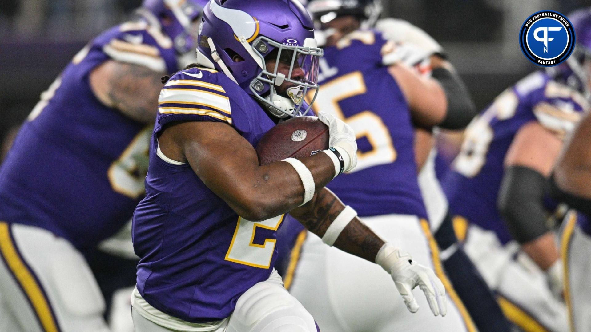 Minnesota Vikings running back Alexander Mattison (2) runs the ball against the Chicago Bears at U.S. Bank Stadium.