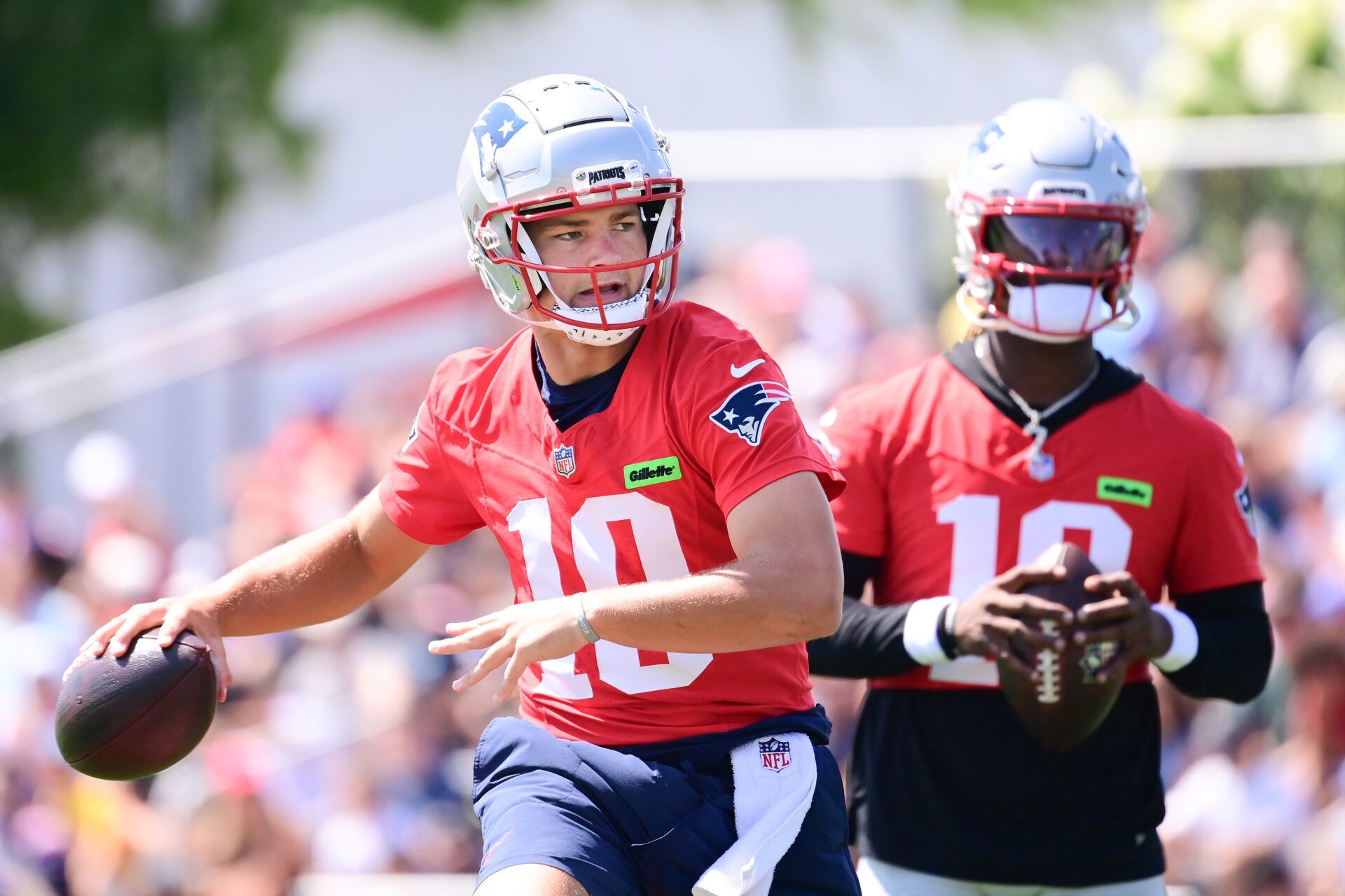 Jul 26, 2024; Foxborough, MA, USA; New England Patriots quarterback Drake Maye (10) throws a pass during training camp at Gillette Stadium. Mandatory Credit: Eric Canha-USA TODAY Sports