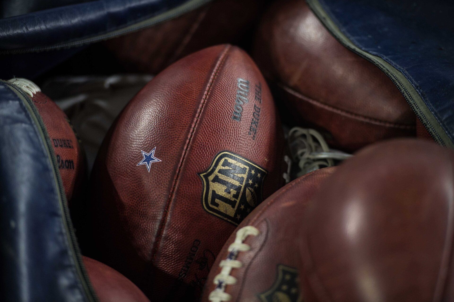 Aug 19, 2016; Arlington, TX, USA; A view of NFL footballs and the Dallas Cowboys logo during the game between the Cowboys and the Miami Dolphins at AT&T Stadium. The Cowboys defeat the Dolphins 41-14. Mandatory Credit: Jerome Miron-USA TODAY Sports