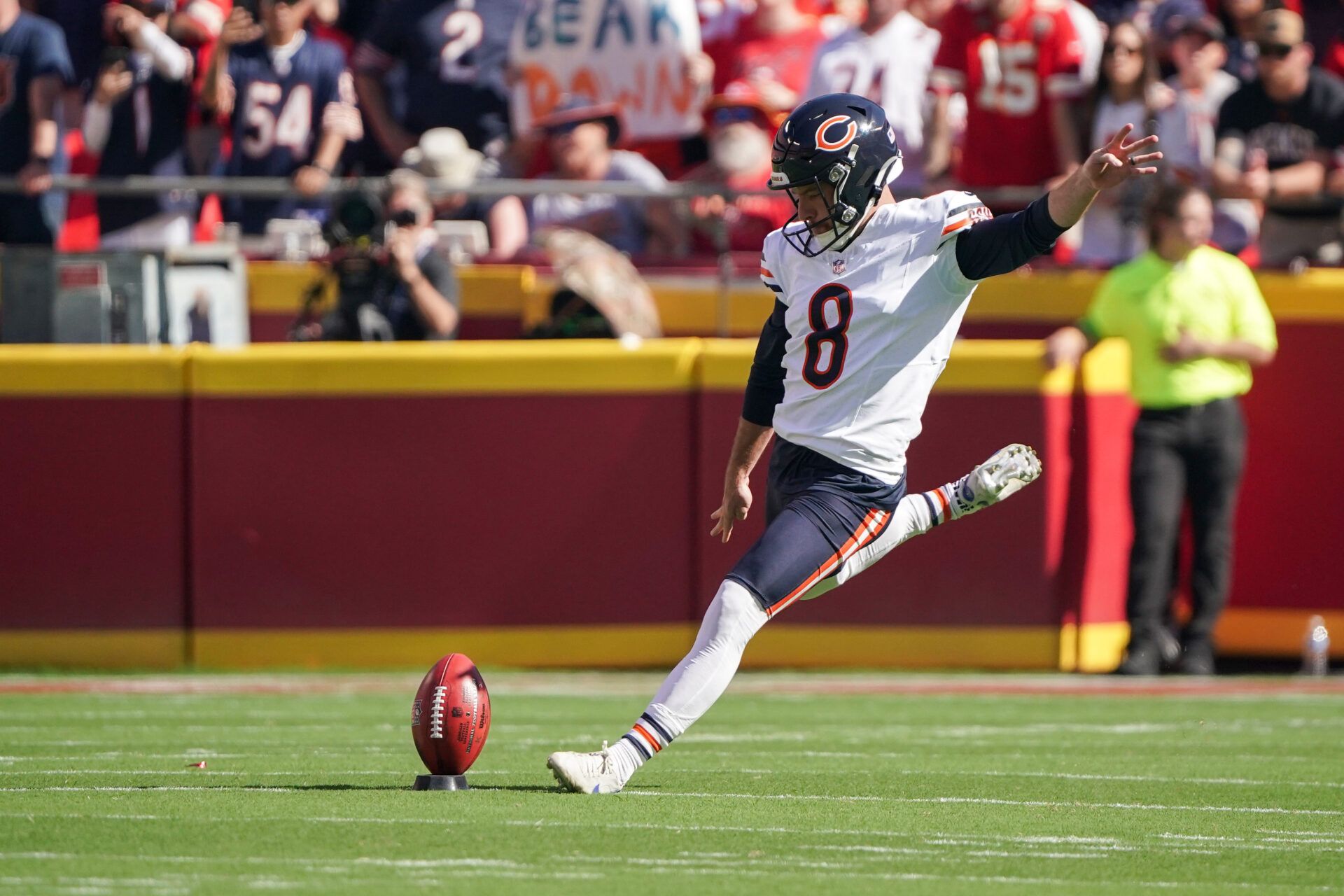 Sep 24, 2023; Kansas City, Missouri, USA; Chicago Bears place kicker Cairo Santos (8) makes the opening kickoff against the Kansas City Chiefs during the game at GEHA Field at Arrowhead Stadium. Mandatory Credit: Denny Medley-USA TODAY Sports