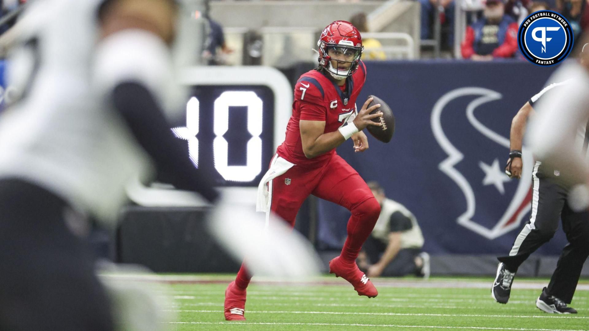 Houston Texans quarterback C.J. Stroud (7) runs with the ball during the first quarter against the Jacksonville Jaguars at NRG Stadium. Where does he land in our dynasty fantasy football rankings?