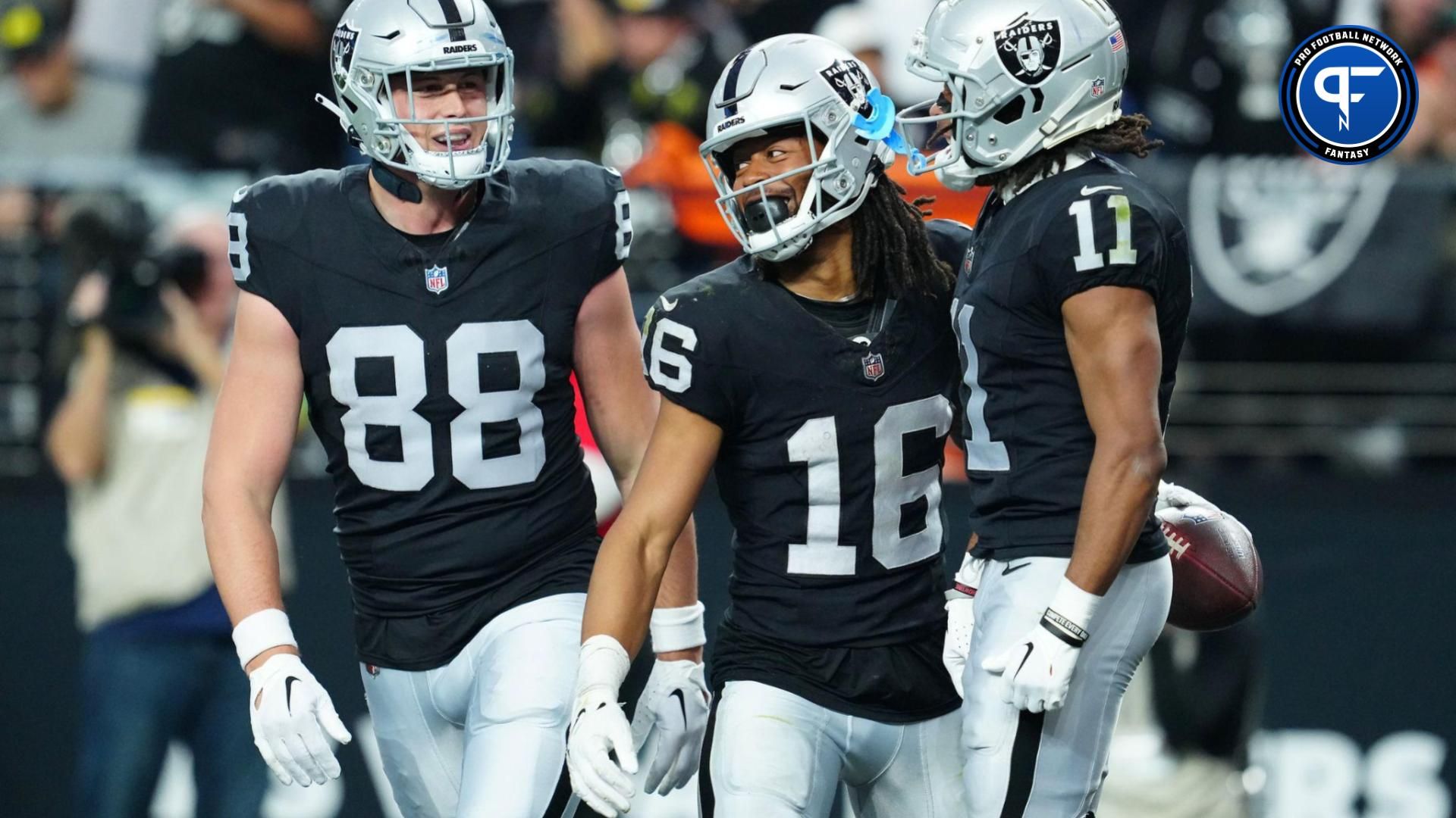 Indianapolis Colts cornerback Chris Lammons (35) dives after Las Vegas Raiders wide receiver Jakobi Meyers (16) during a game against the Las Vegas Raiders at Lucas Oil Stadium.