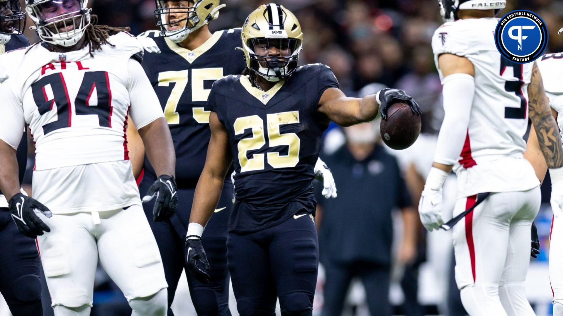 Jan 7, 2024; New Orleans, Louisiana, USA; New Orleans Saints running back Kendre Miller (25) reacts to m aligns. First down against Atlanta Falcons safety Jessie Bates III (3) during the first half at Caesars Superdome. Mandatory Credit: Stephen Lew-USA TODAY Sports