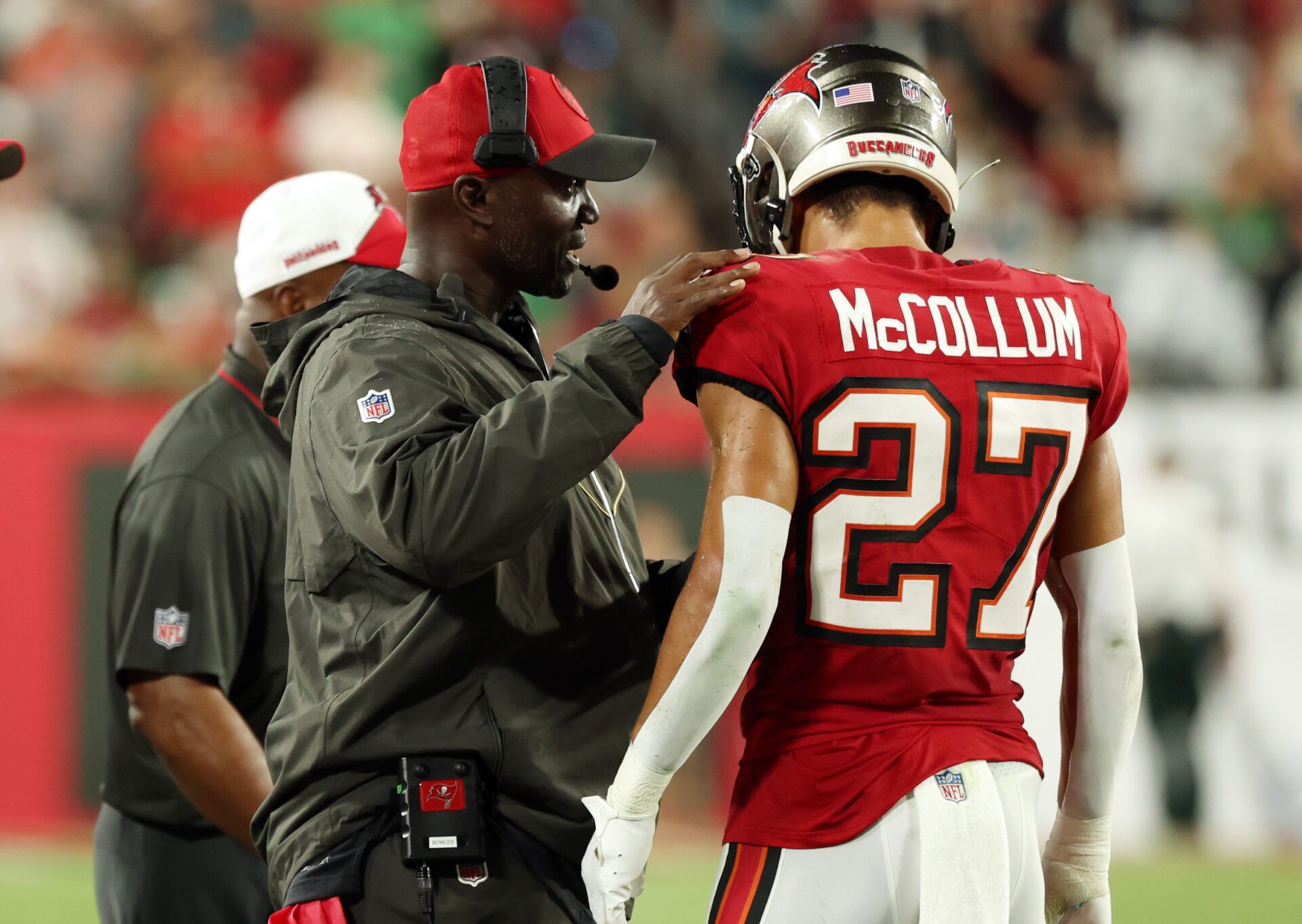 Sep 25, 2023; Tampa, Florida, USA; Tampa Bay Buccaneers head coach Todd Bowles talks with cornerback Zyon McCollum (27) against the Philadelphia Eagles during the first half at Raymond James Stadium. Mandatory Credit: Kim Klement Neitzel-USA TODAY Sports