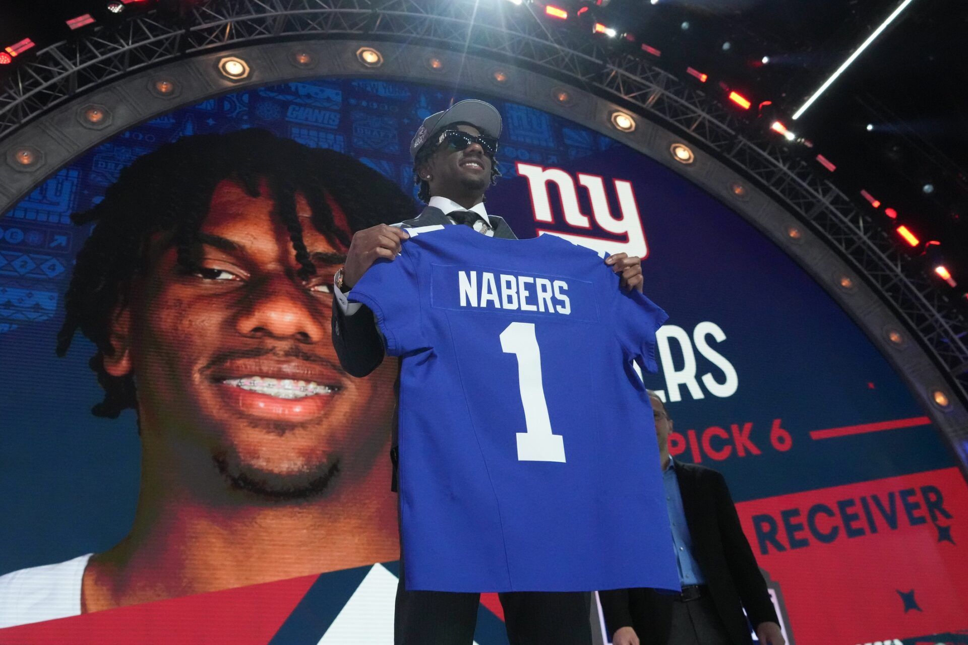 LSU Tigers wide receiver Malik Nabers poses after being selected by the New York Giants as the No. 6 pick in the first round of the 2024 NFL Draft at Campus Martius Park and Hart Plaza.