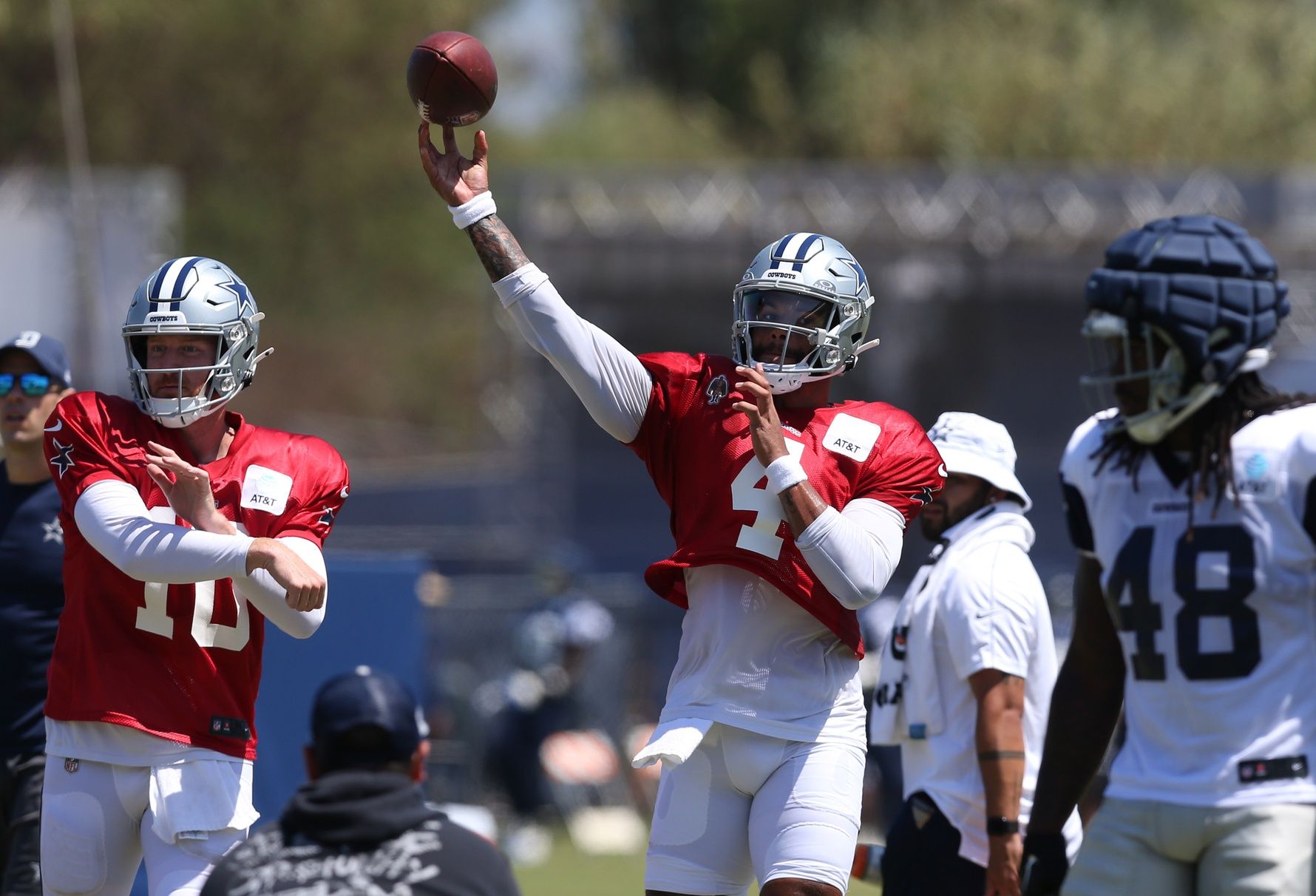 Dallas Cowboys quarterback Dak Prescott (4) throws during training camp at the River Ridge Playing Fields in Oxnard, California.