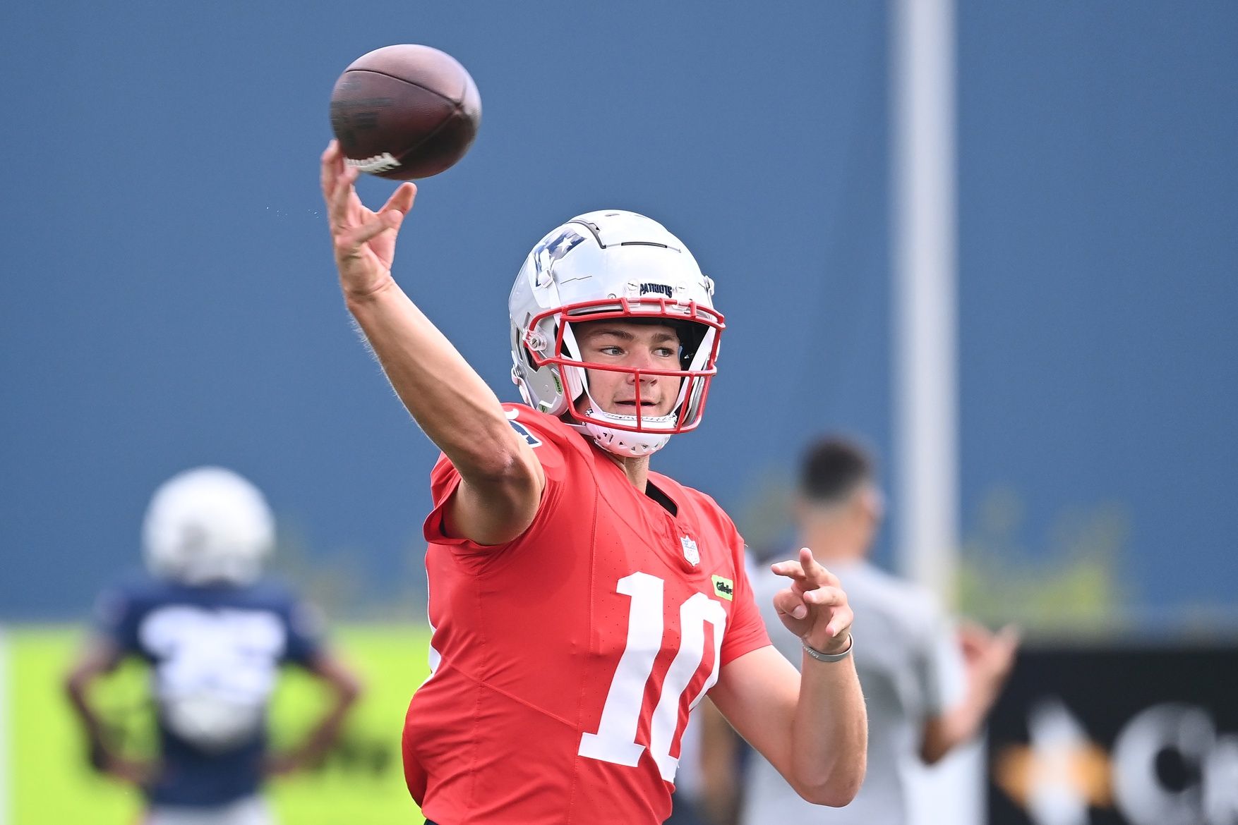 New England Patriots QB Drake Maye (10) throws a pass during training camp.