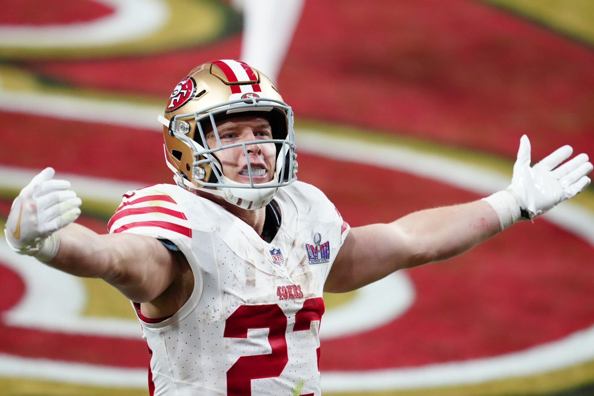 San Francisco 49ers RB Christian McCaffrey (23) celebrates after a touchdown against the Kansas City Chiefs in the Super Bowl.