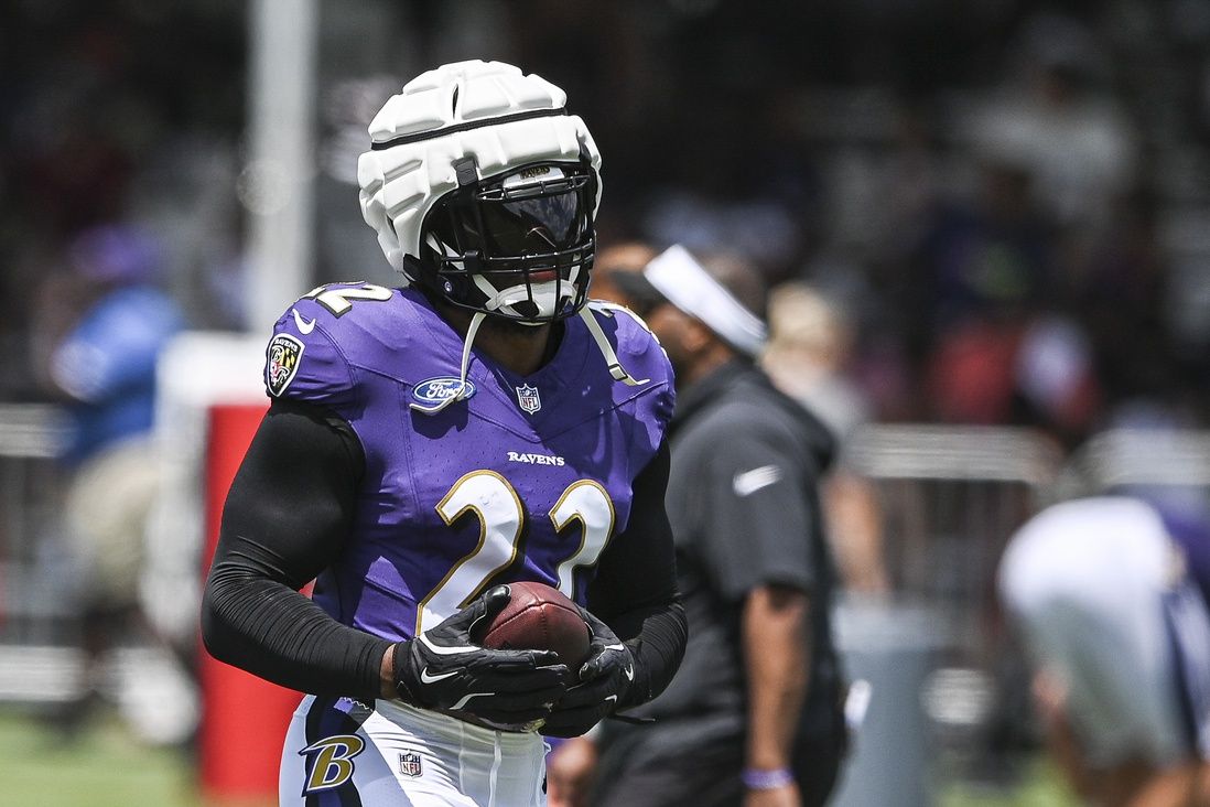 Baltimore Ravens RB Derrick Henry (22) completes a drill during training camp.