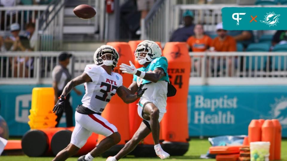 Miami Dolphins wide receiver Malik Washington (83) catches the football against Atlanta Falcons cornerback Antonio Hamilton Sr. (33) during a joint practice at Baptist Health Training Complex. Mandatory Credit: Sam Navarro-USA TODAY Sports
