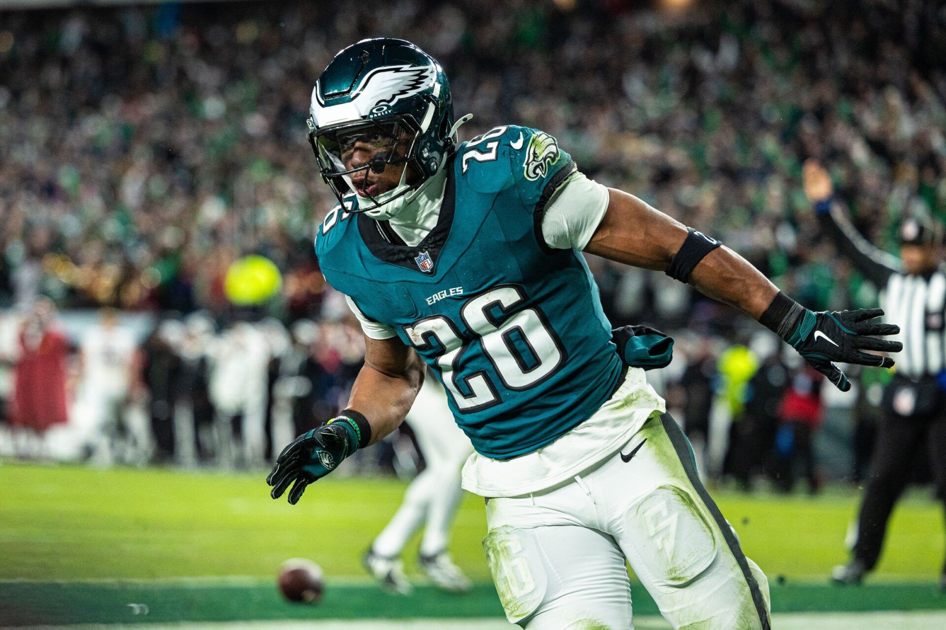 Philadelphia Eagles running back Saquon Barkley (26) reacts after his touchdown run against the Washington Commanders during the fourth quarter at Lincoln Financial Field.