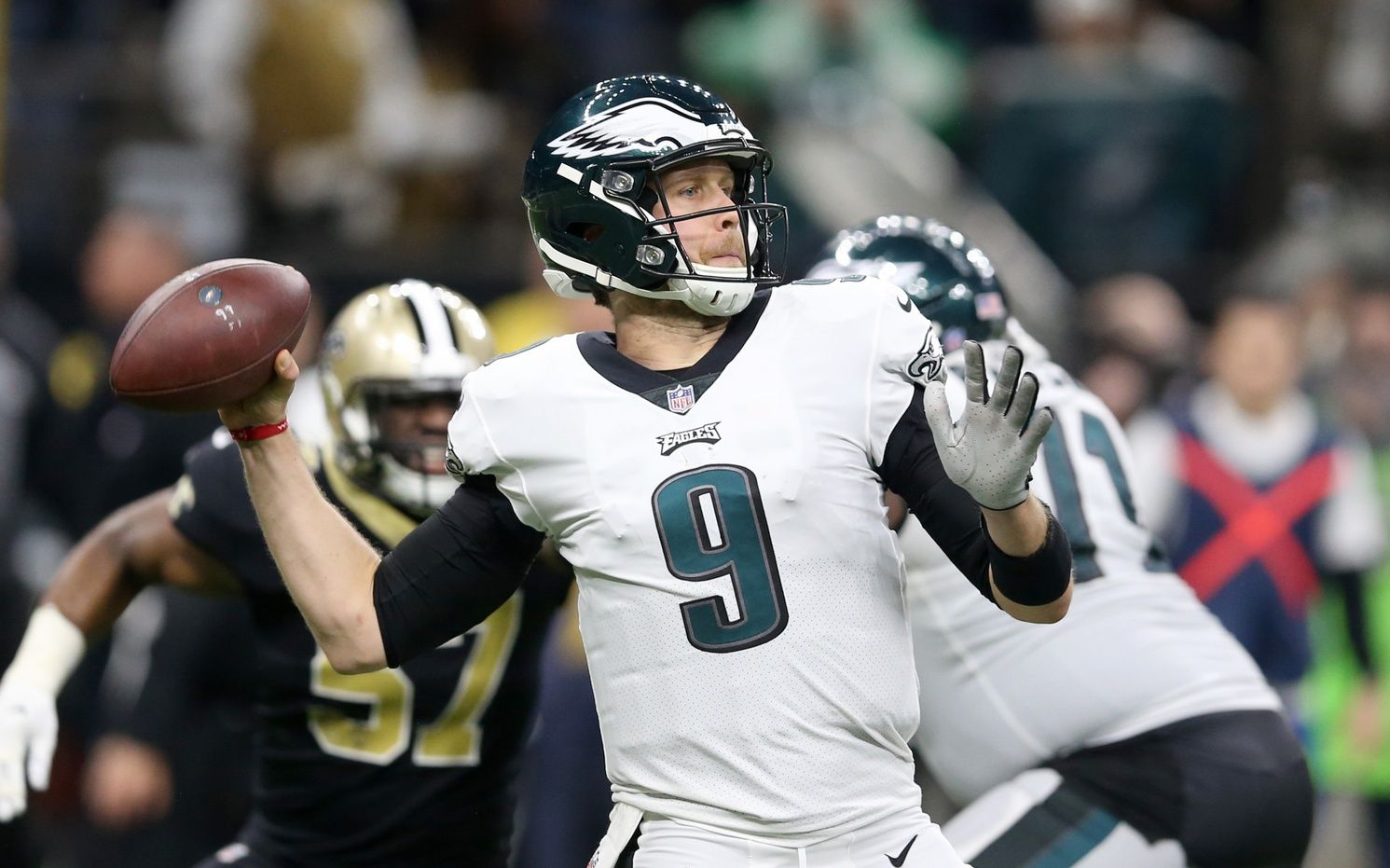 Philadelphia Eagles quarterback Nick Foles (9) makes a throw during the third quarter of a NFC Divisional playoff football game against the New Orleans Saints at Mercedes-Benz Superdome. Mandatory Credit: Chuck Cook-USA TODAY Sports