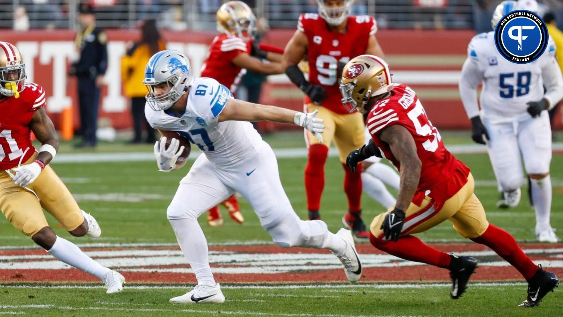 Lions tight end Sam LaPorta runs the ball around 49ers linebacker Dre Greenlaw in the second quarter of the NFC championship game at Levi's Stadium in Santa Clara, California, on Sunday, Jan. 28, 2024. Fantasy Injury Update