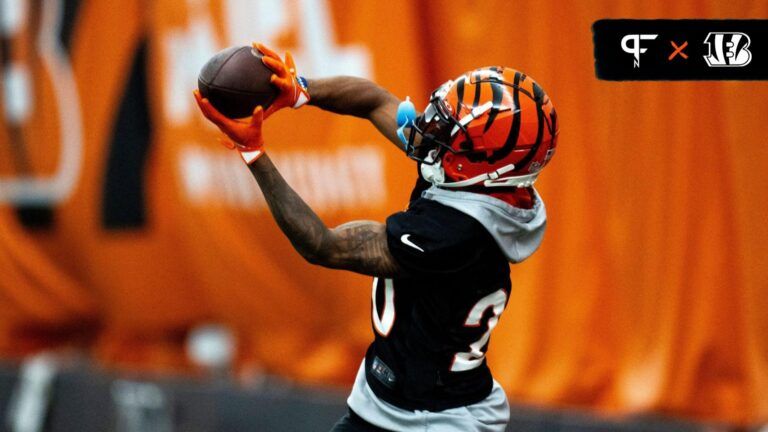 Cincinnati Bengals cornerback DJ Turner II (20) catches a pass during an interception drill at Bengals spring practice at the IEL Indoor Facility in Cincinnati on Tuesday, June 11, 2024.