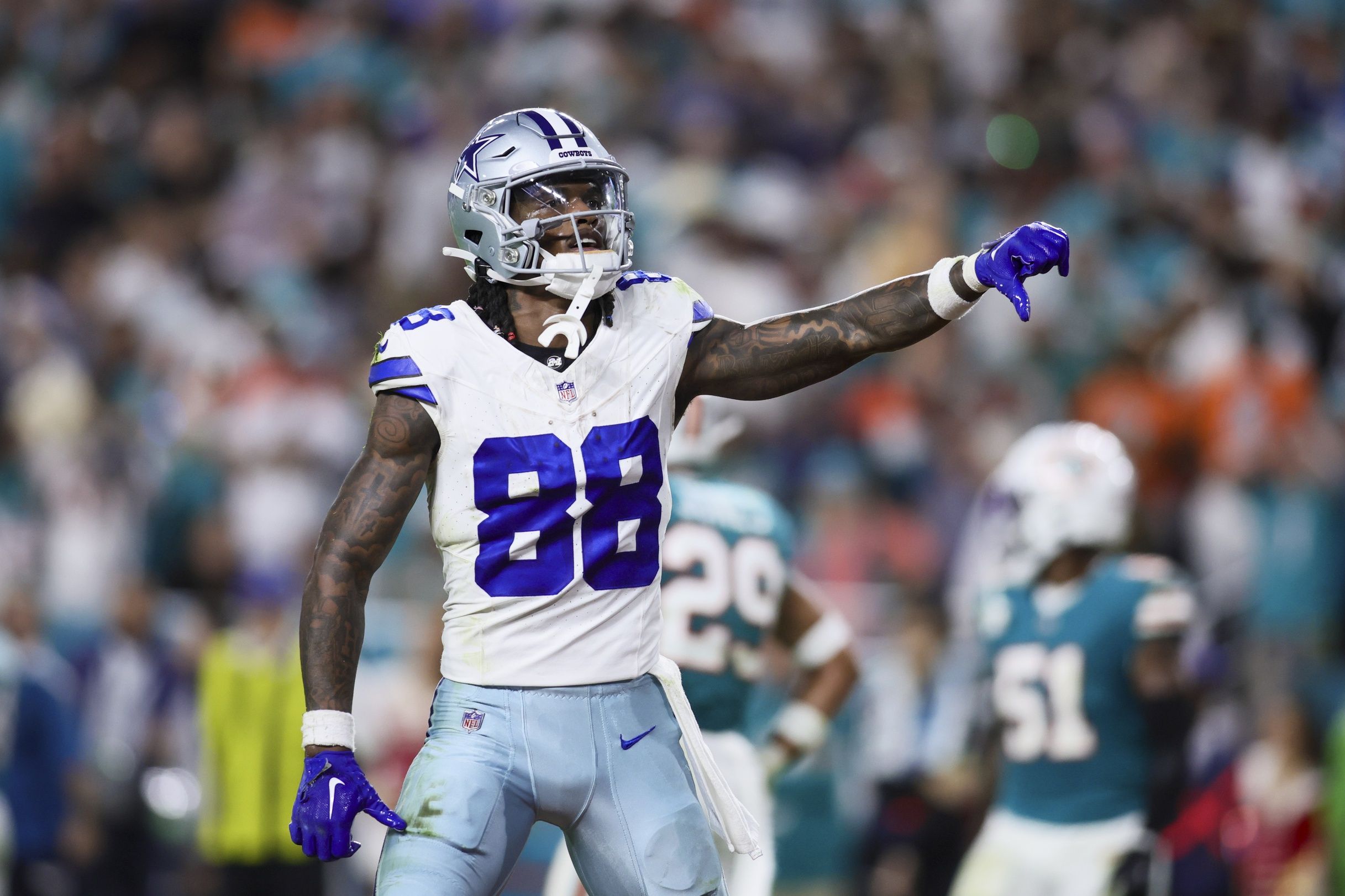 Dallas Cowboys wide receiver CeeDee Lamb (88) reacts toward Miami Dolphins fans during the fourth quarter at Hard Rock Stadium. Mandatory Credit: Sam Navarro-USA TODAY Sports