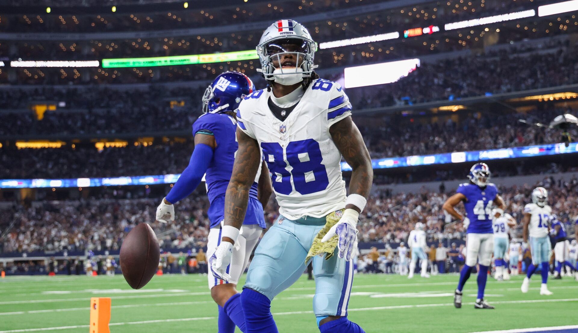 Dallas Cowboys wide receiver CeeDee Lamb (88) makes a touchdown catch past New York Giants safety Bobby McCain (21) during the second half at AT&T Stadium. Mandatory Credit: Kevin Jairaj-USA TODAY Sports