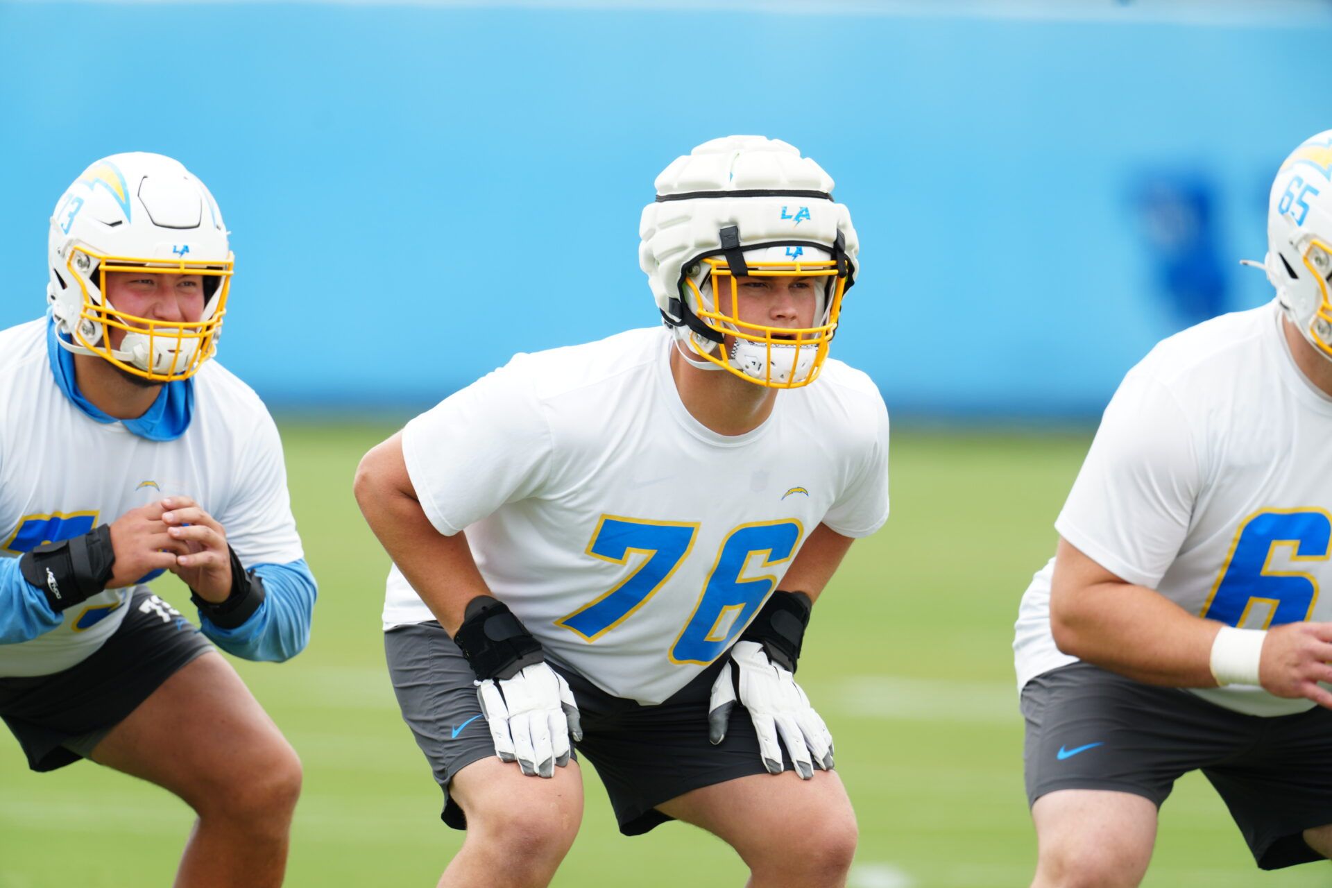 Los Angeles Chargers tackle Joe Alt (76) wears a Guardian helmet cap during organized team activities at the Hoag Performance Center. Mandatory Credit: Kirby Lee-USA TODAY Sports