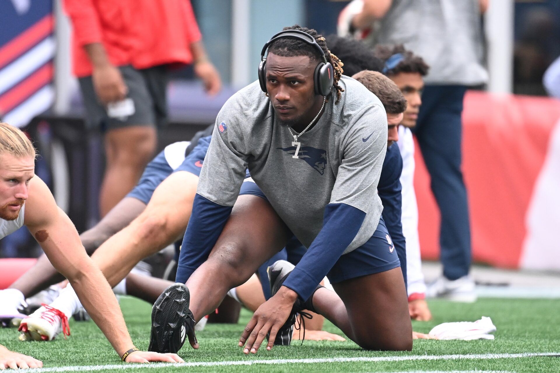 New England Patriots quarterback Joe Milton III (19) warms up before a game against the Carolina Panthers at Gillette Stadium.