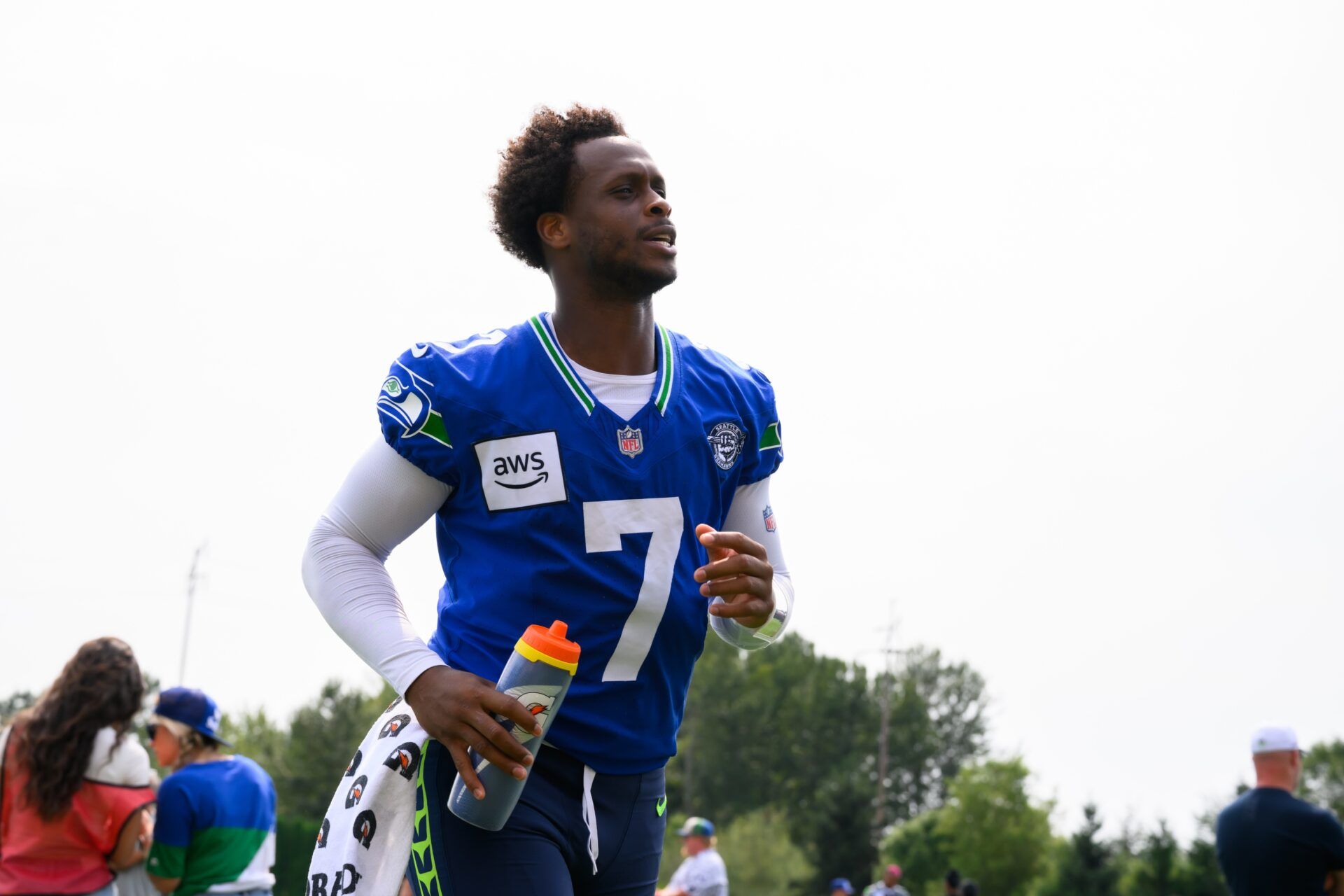 Seattle Seahawks quarterback Geno Smith (7) jogs off the field after training camp at Virginia Mason Athletic Center. Mandatory Credit: Steven Bisig-USA TODAY Sports
