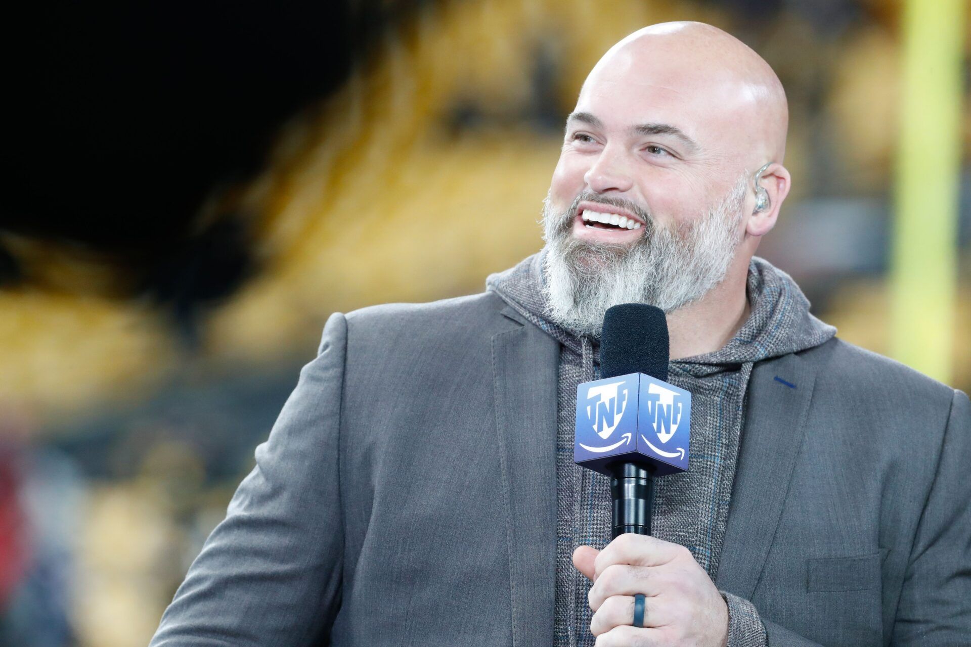 Amazon Prime Video Thursday Night Football analyst Andrew Whitworth performs the pre-game broadcast before the Pittsburgh Steelers host the New England Patriots at Acrisure Stadium. Mandatory Credit: Charles LeClaire-USA TODAY Sports