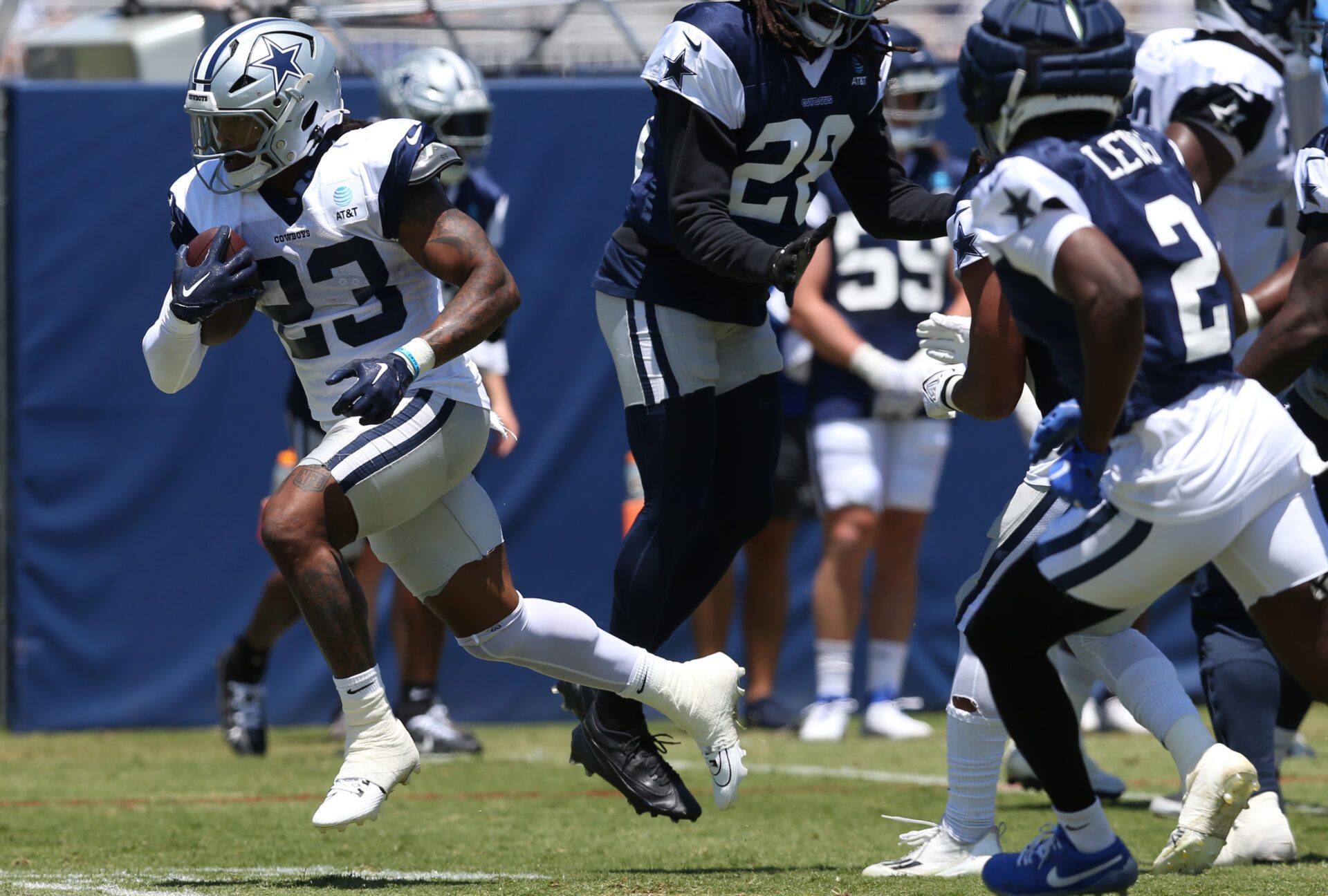 Jul 30, 2024; Oxnard, CA, USA; Dallas Cowboys running back Rico Dowdle (23) runs during training camp at the River Ridge Playing Fields in Oxnard, California. Mandatory Credit: Jason Parkhurst-USA TODAY Sports