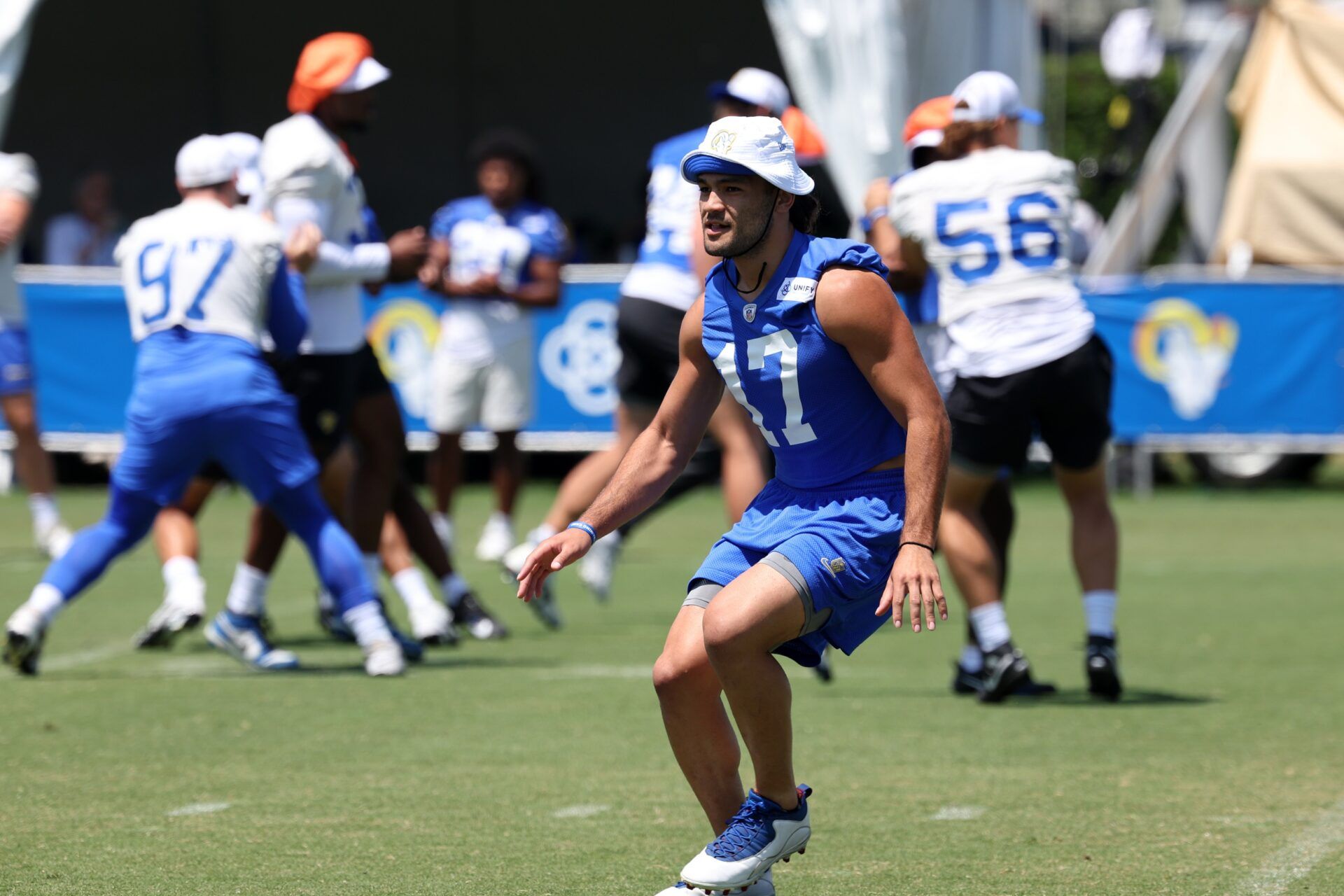 Los Angeles Rams WR Puka Nacua (17) participates in drills during training camp.