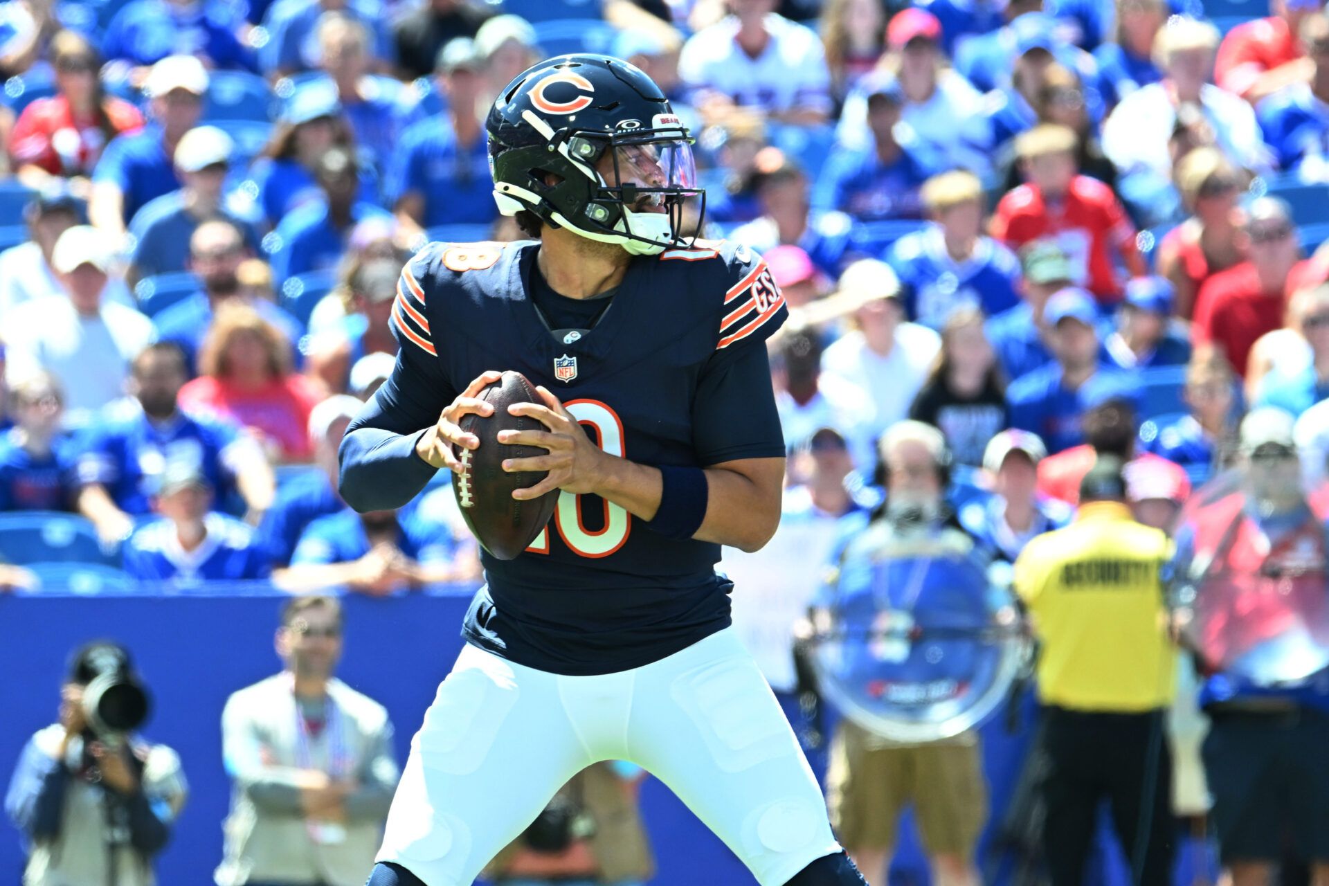 Aug 10, 2024; Orchard Park, New York, USA; Chicago Bears quarterback Caleb Williams (18) prepares for a pass in the first quarter of a pre-season game against the Buffalo Bills at Highmark Stadium. Mandatory Credit: Mark Konezny-USA TODAY Sports