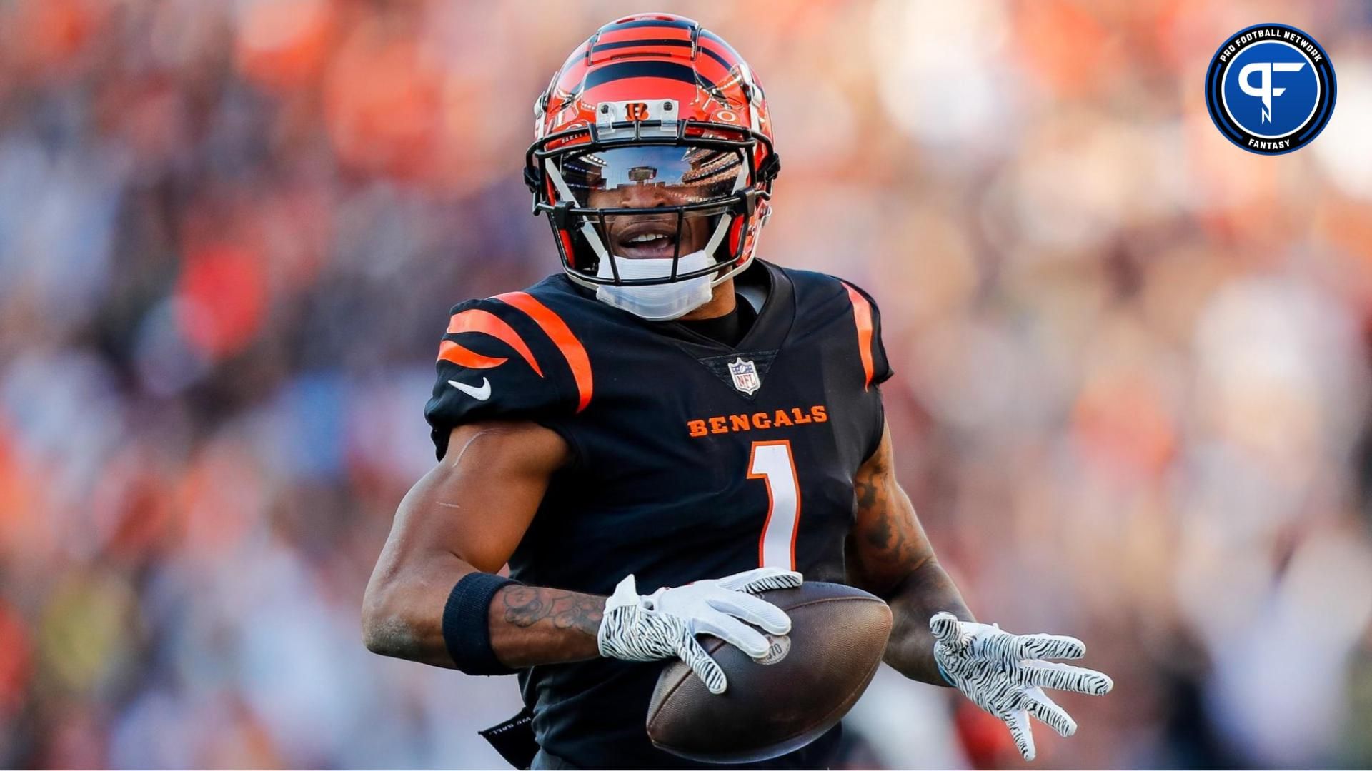 Cincinnati Bengals wide receiver Ja'Marr Chase (1) runs the ball in for a touchdown against the Houston Texans in the second half at Paycor Stadium. Chase is one of many WRs who is his team's top fantasy football player. Mandatory Credit: Katie Stratman-USA TODAY