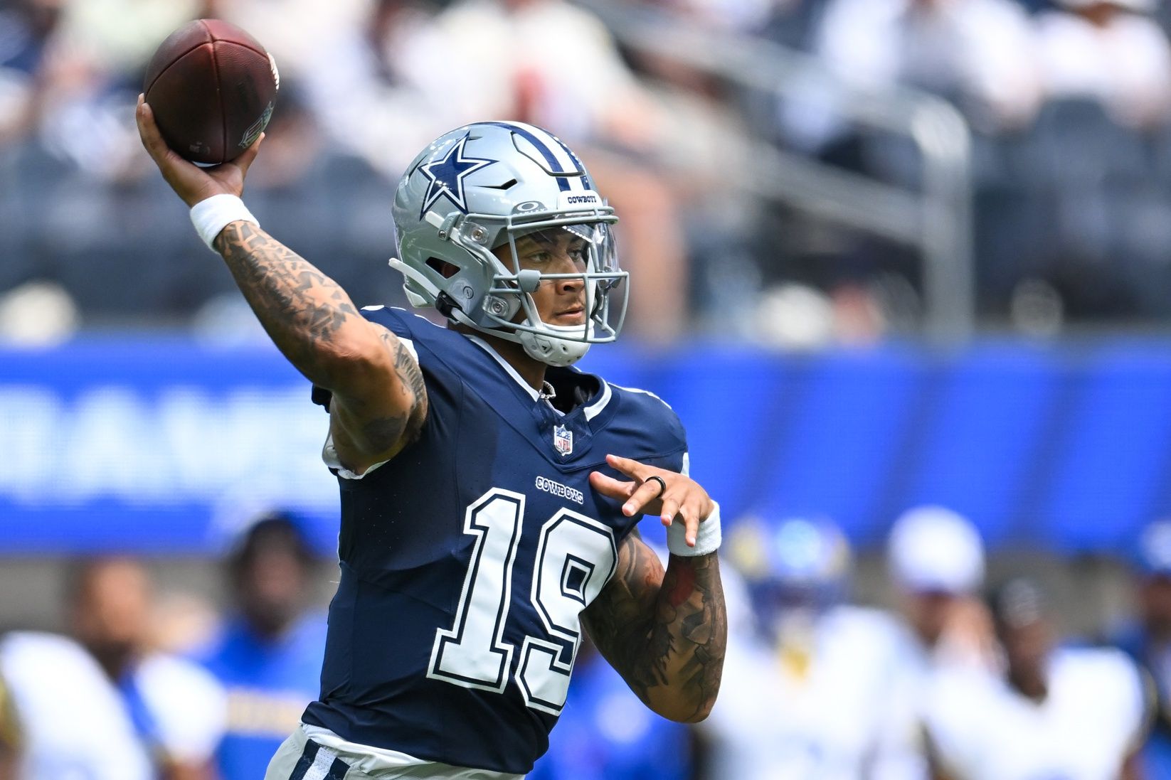 Dallas Cowboys QB Trey Lance (19) throws a pass against the Los Angeles Rams.