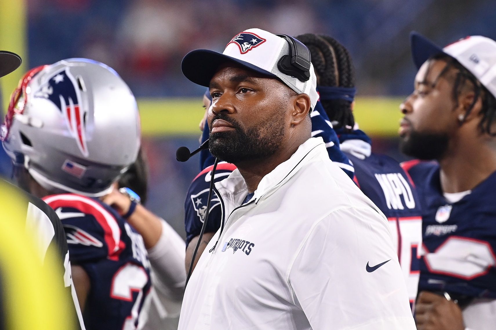 New England Patriots head coach Jerod Mayo looks on during the team's preseason game against the Carolina Panthers.