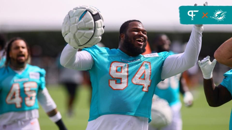 Miami Dolphins defensive tackle Teair Tart (94) reacts toward the fans during training camp at Baptist Health Training Complex.