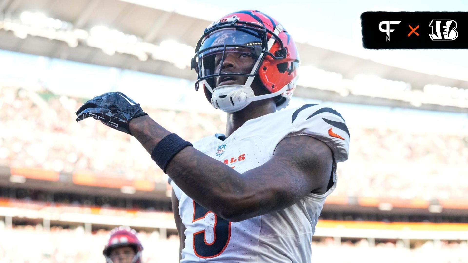 Cincinnati Bengals wide receiver Tee Higgins (5) runs through the end zone on a touchdown reception in the first quarter of the NFL Preseason Week 1 game between the Cincinnati Bengals and the Tampa Bay Buccaneers at Paycor Stadium in downtown Cincinnati on Saturday, Aug. 10, 2024.