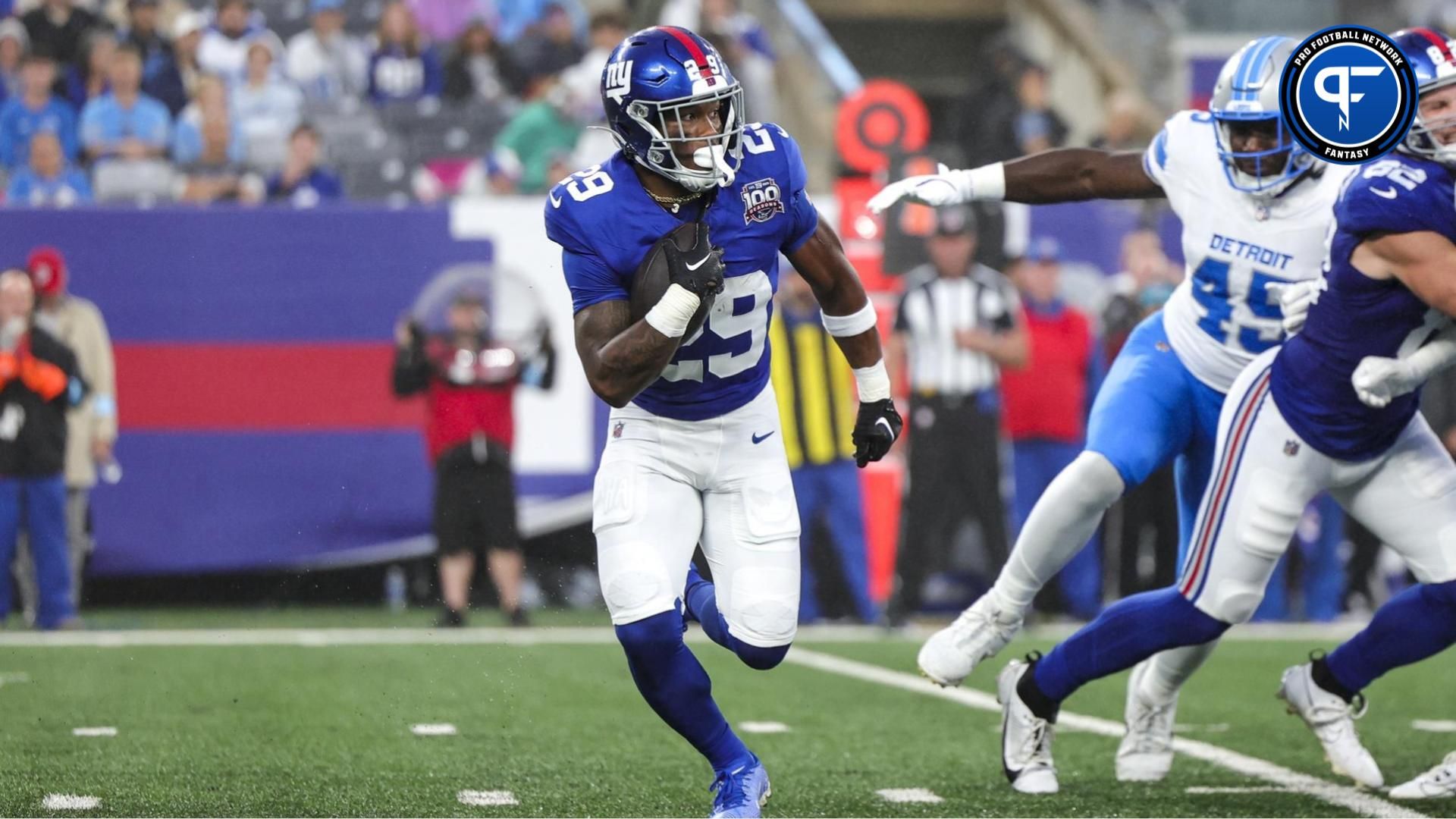 New York Giants running back Tyrone Tracy Jr. (29) runs in the backfield against the Detroit Lions at MetLife Stadium. Mandatory Credit: Scott Rausenberger-USA TODAY Sports