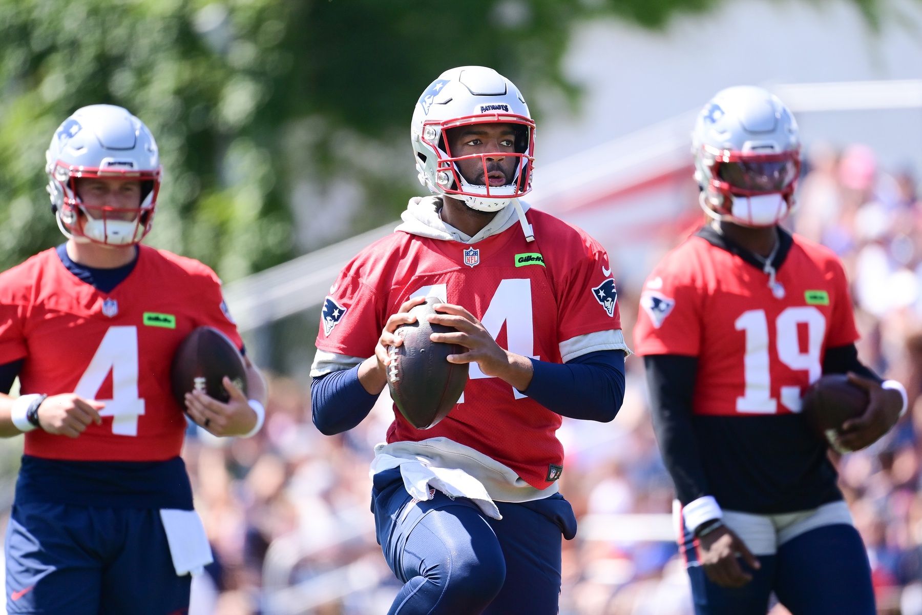 New England Patriots quarterback Jacoby Brissett (14) throws a pass during training camp at Gillette Stadium. Mandatory Credit: Eric Canha-USA TODAY Sports