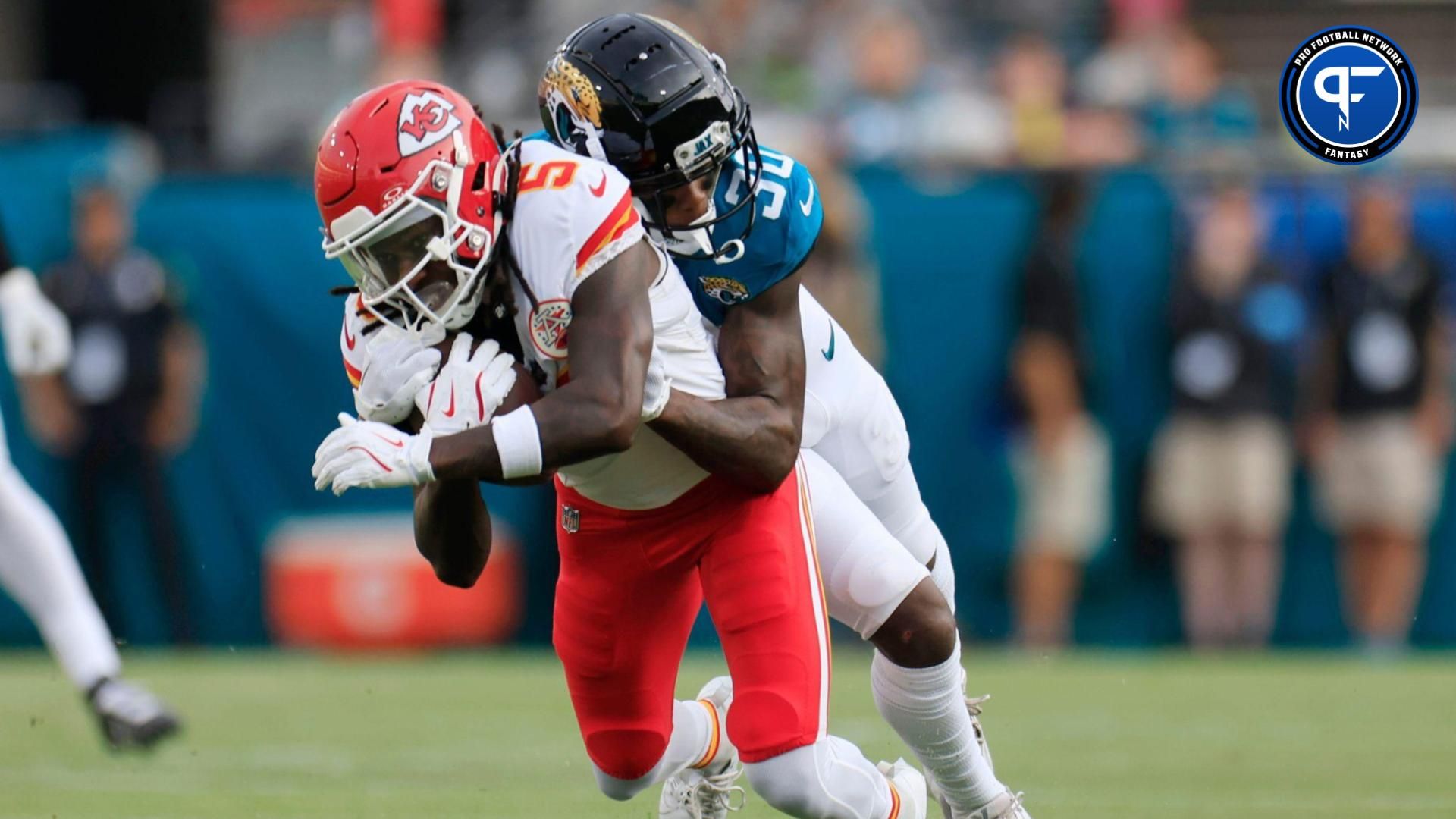 Jacksonville Jaguars cornerback Montaric Brown (30) tackles Kansas City Chiefs wide receiver Hollywood Brown (5) during the first quarter of a preseason NFL football game Saturday, Aug. 10, 2024 at EverBank Stadium in Jacksonville, Fla. [Corey Perrine/Florida Times-Union]