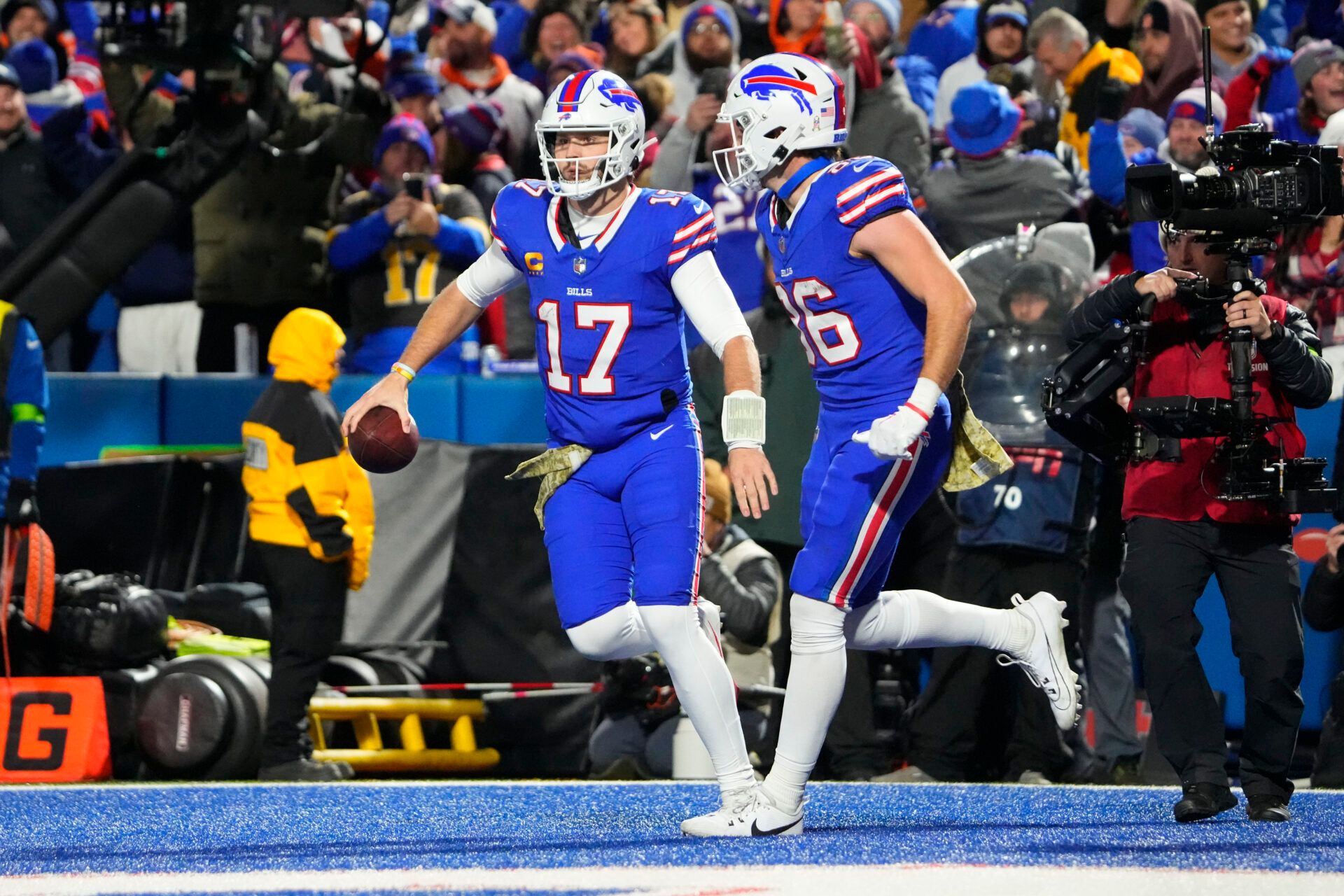 Nov 13, 2023; Orchard Park, New York, USA; Buffalo Bills tight end Dalton Kincaid (86) congratulates quarterback Josh Allen (17) for scoring a touchdown against the Denver Broncos during the second half at Highmark Stadium. Mandatory Credit: Gregory Fisher-USA TODAY Sports