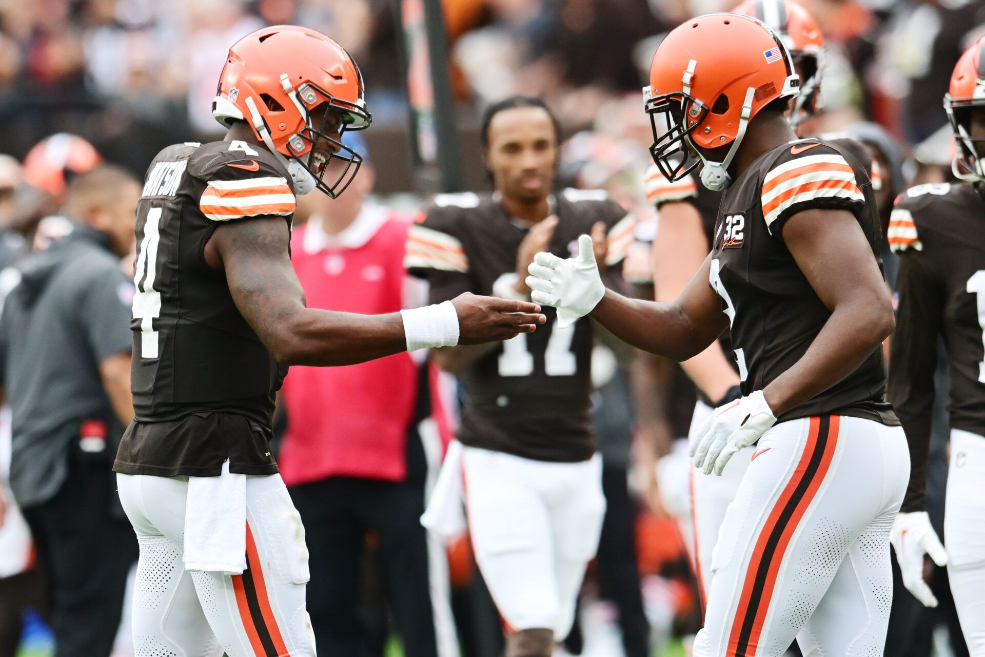 Sep 24, 2023; Cleveland, Ohio, USA; Cleveland Browns quarterback Deshaun Watson (4) celebrates with wide receiver Amari Cooper (2) after they connected on a touchdown pass during the second half against the Tennessee Titans at Cleveland Browns Stadium. Mandatory Credit: Ken Blaze-USA TODAY Sports