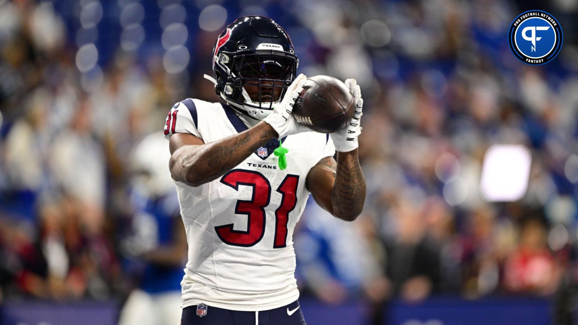 Houston Texans running back Dameon Pierce (31) catches a pass during warm ups before a game against the Indianapolis Colts at Lucas Oil Stadium. Mandatory Credit: Marc Lebryk-USA TODAY Sports