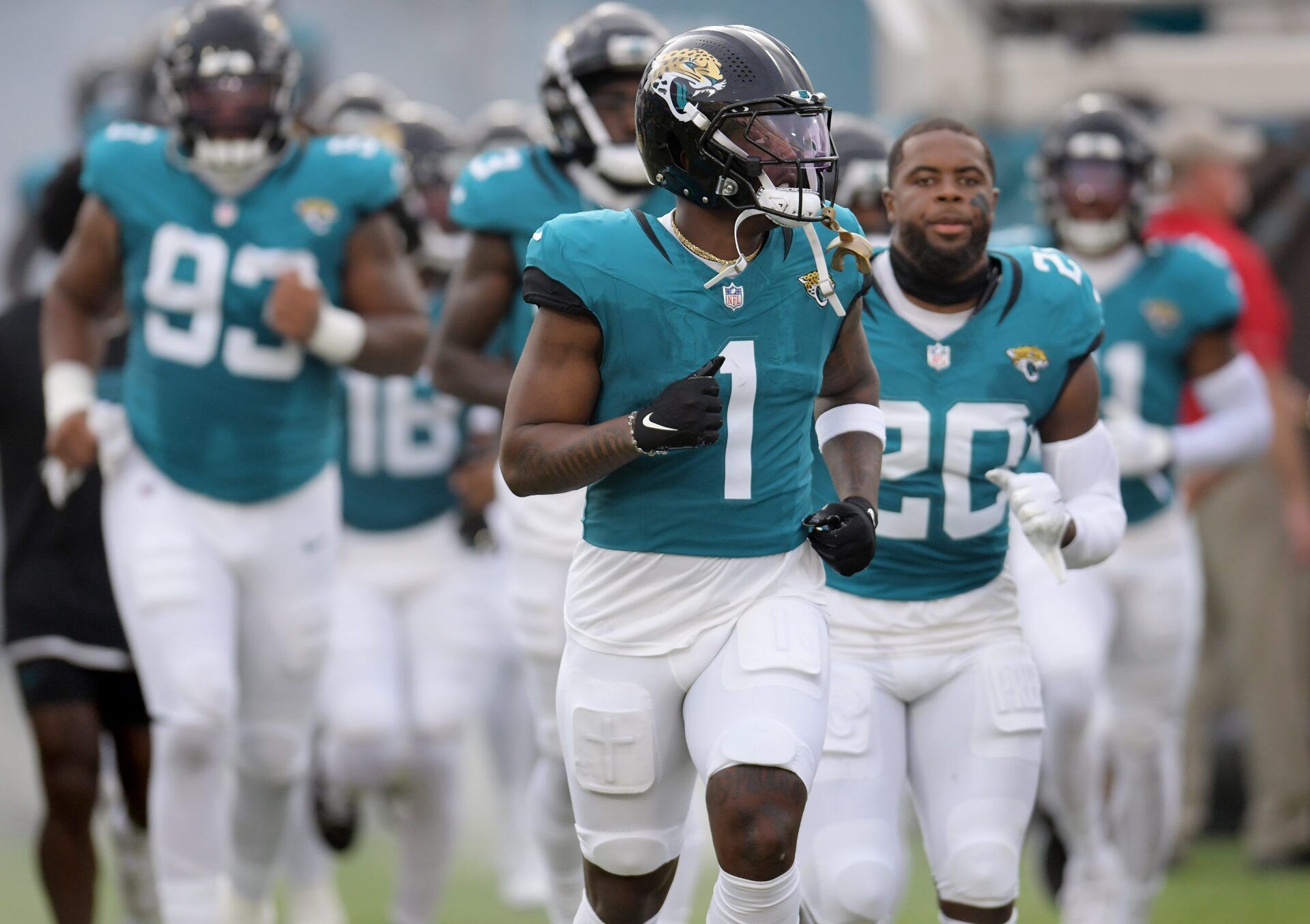 Jacksonville Jaguars running back Travis Etienne Jr. (1) runs onto the field with teammates. The Jaguars led 20 to 10 at the end of the first half. The Jacksonville Jaguars hosted the Kansas City Chiefs in the Jaguars first preseason game of the season Saturday, August10, 2024 at EverBank Stadium in Jacksonville, Fla. [Bob Self/Florida Times-Union]