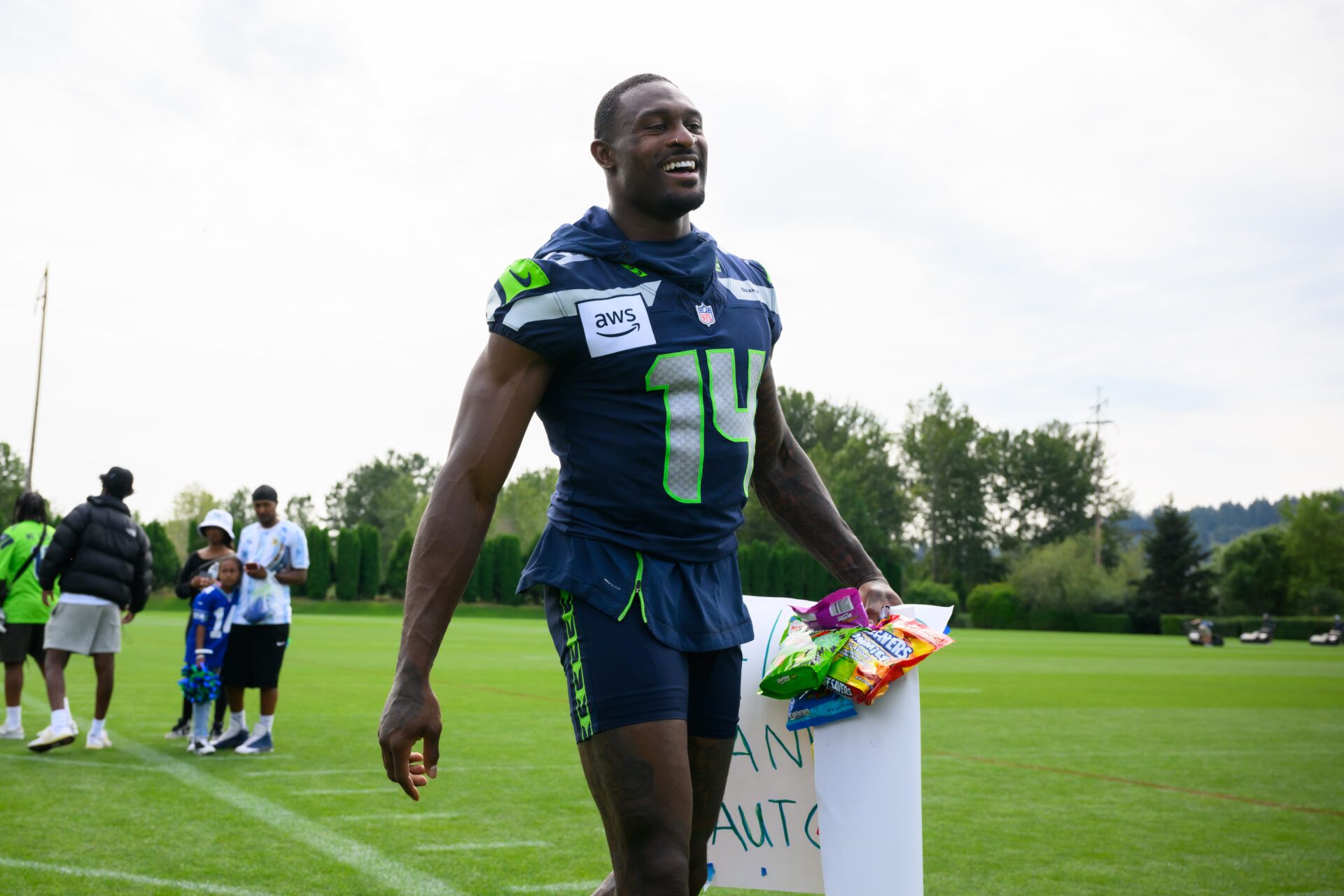 Jul 27, 2024; Renton, WA, USA; Seattle Seahawks wide receiver DK Metcalf (14) walks off the field after training camp at Virginia Mason Athletic Center. Mandatory Credit: Steven Bisig-USA TODAY Sports