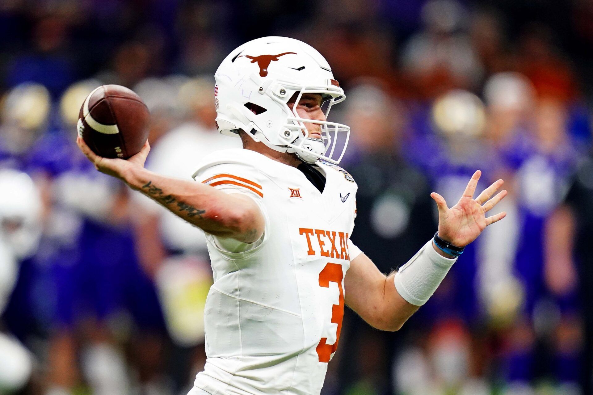 Texas Longhorns quarterback Quinn Ewers (3) throws a pass during the fourth quarter against the Washington Huskies in the 2024 Sugar Bowl college football playoff semifinal game at Caesars Superdome. Ewers lands in the NFC in this 2025 NFL Mock Draft. Mandatory Credit: John David Mercer-USA TODAY Sports