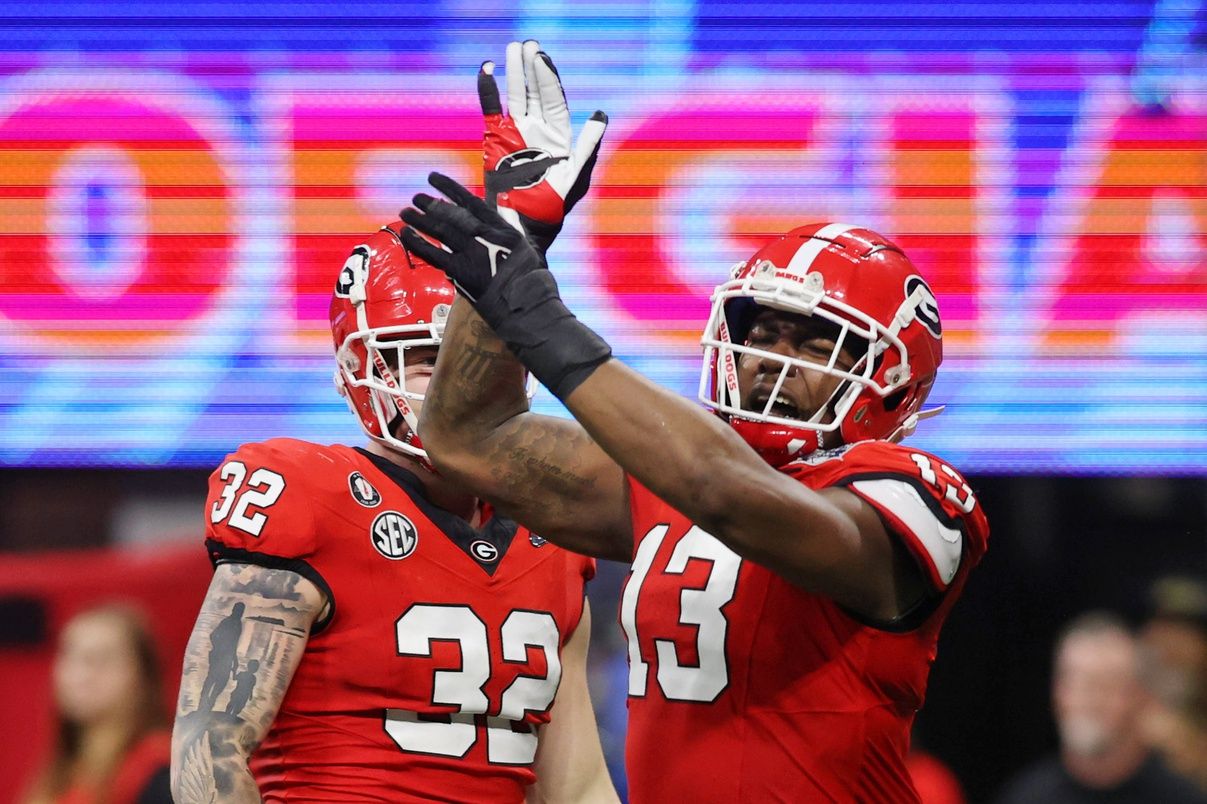 Georgia Bulldogs defensive lineman Mykel Williams (13) reacts after a play against the Ohio State Buckeyes during the first half of the 2022 Peach Bowl at Mercedes-Benz Stadium. Mandatory Credit: Brett Davis-USA TODAY Sports