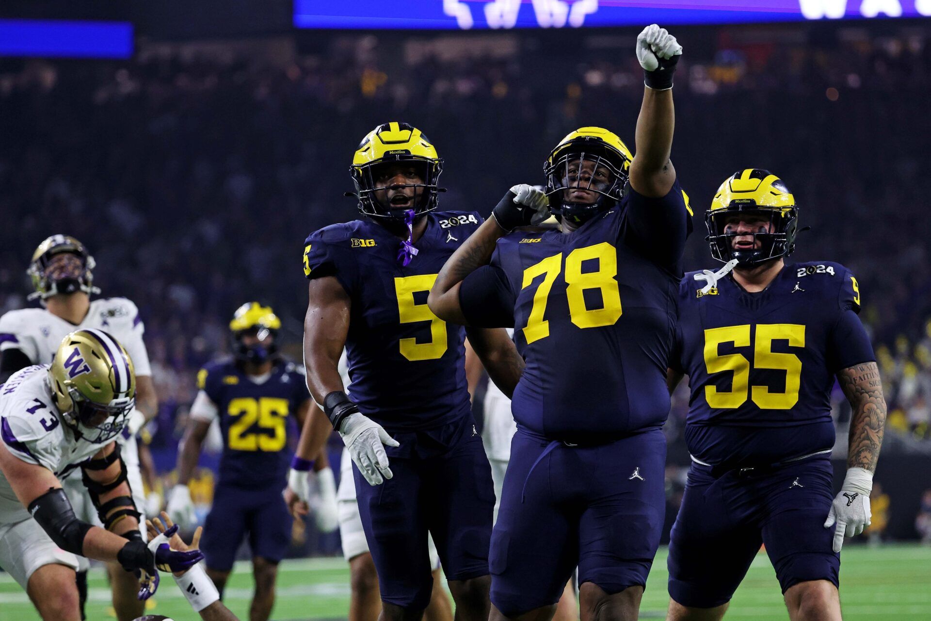 Michigan Wolverines defensive lineman Kenneth Grant (78) celebrates after a sack during the second quarter against the Washington Huskies in the 2024 College Football Playoff national championship game at NRG Stadium. Mandatory Credit: Troy Taormina-USA TODAY Sports