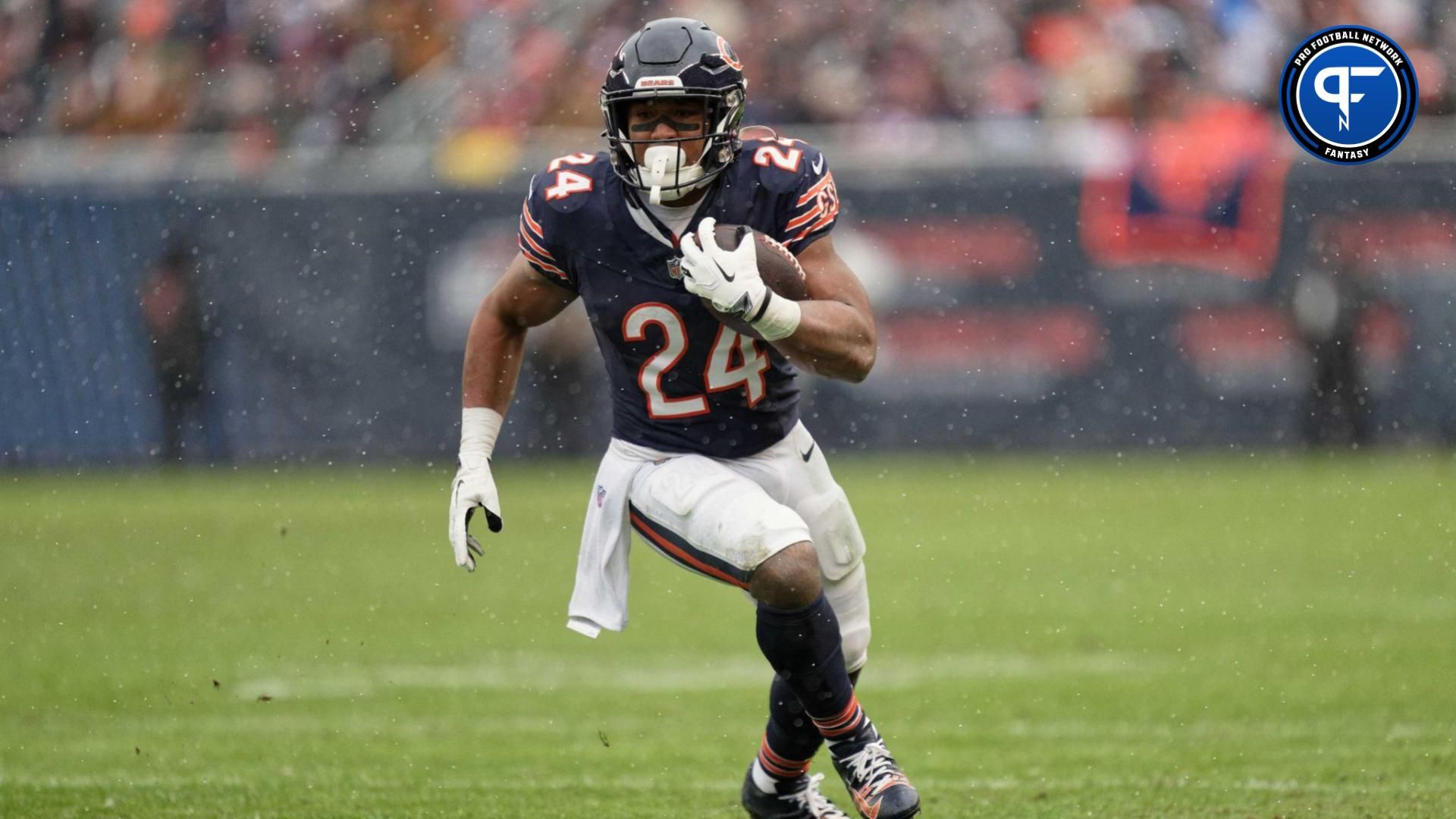 Chicago Bears running back Khalil Herbert (24) runs with the ball against the Atlanta Falcons at Soldier Field. Mandatory Credit: Jamie Sabau-USA TODAY Sports