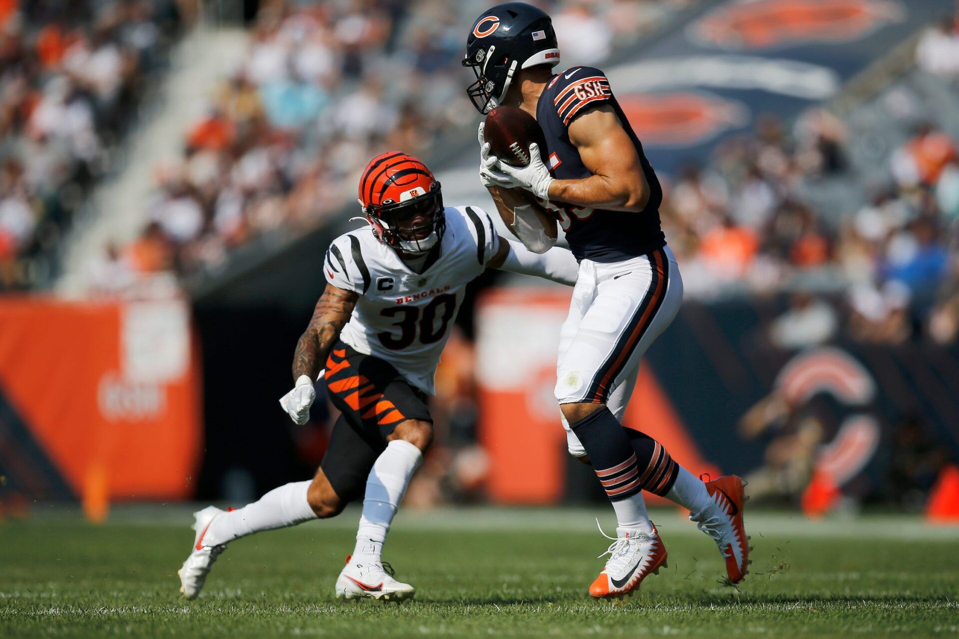 Cincinnati Bengals free safety Jessie Bates (30) closes in on Chicago Bears tight end Cole Kmet (85) as he catches a pass in the fourth quarter of the NFL Week 2 game between the Chicago Bears and the Cincinnati Bengals at Soldier Field in Chicago on Sunday, Sept. 19, 2021. The Bears held on to a halftime lead for a 20-17 win over the Bengals.