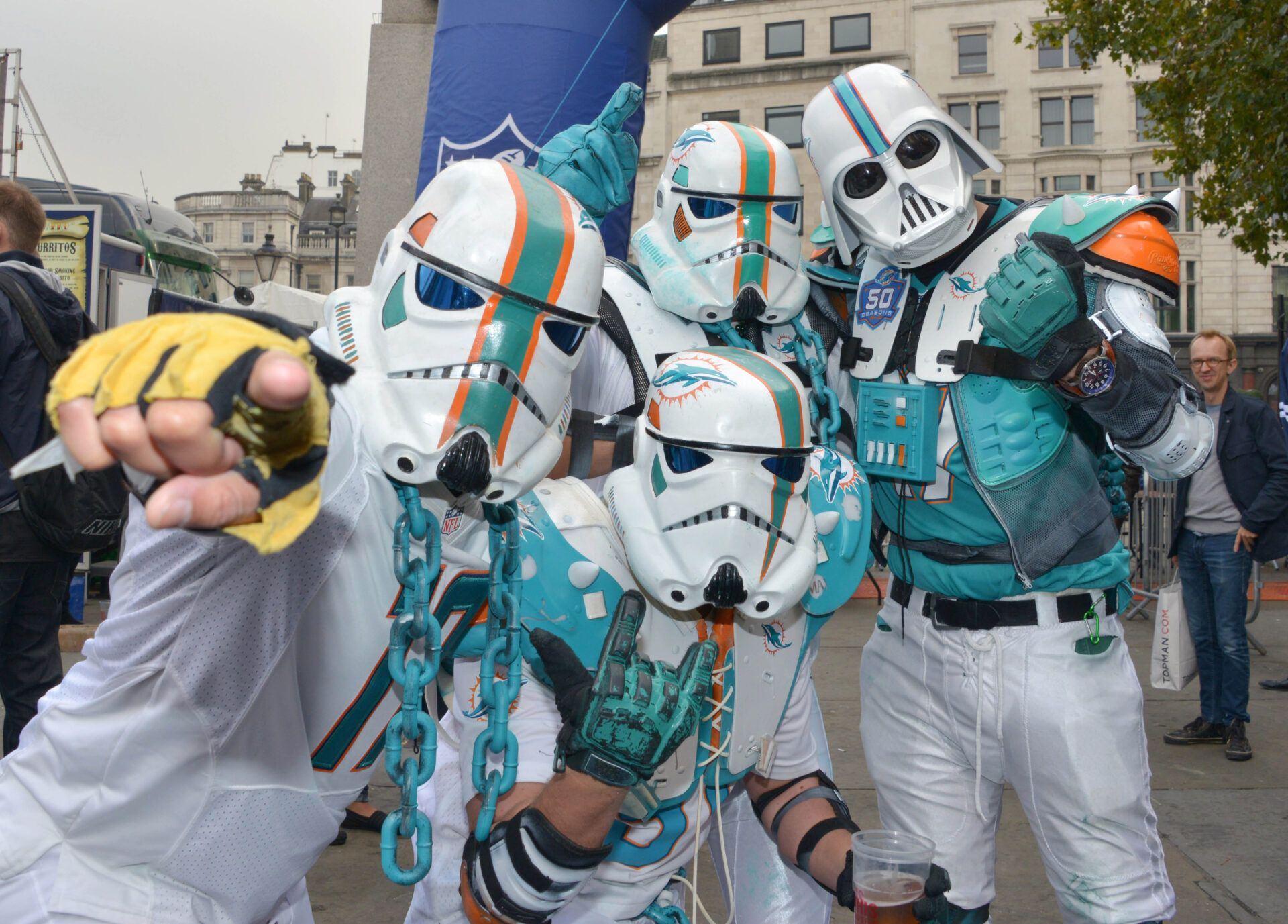 Oct 3, 2015; London, United Kingdom; Miami Dolphins fans wear Stormtrooper costumes from the movie Star Wars prior to the Dolphins' game against the New York Jets at the 2015 NFL International Series Fan Rally at Trafalgar Square. Mandatory Credit: Kirby Lee-USA TODAY Sports