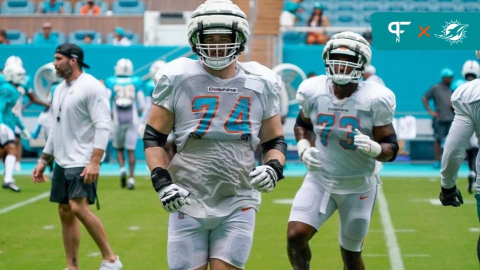 Miami Dolphins OL Liam Eichenberg jogs during practice.