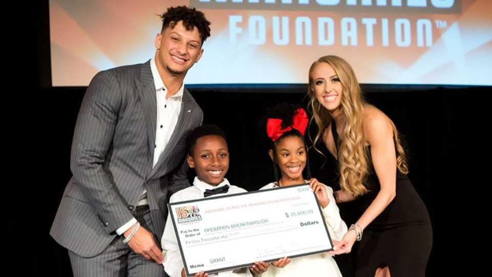 Patrick Mahomes and his wife Brittany Mahomes during a charity event for 15 and The Mahomies Foundation